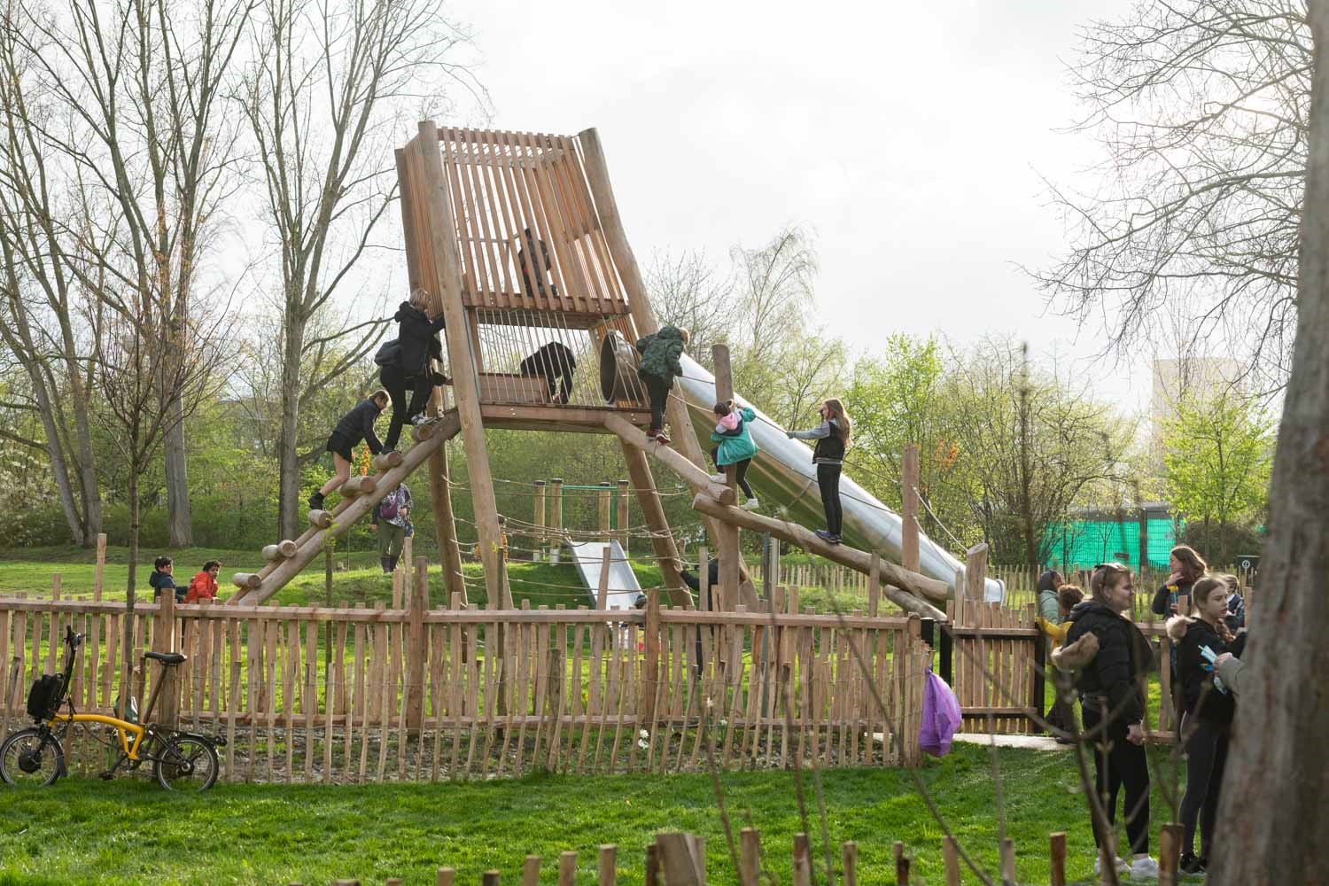 a group of people on a wooden structure