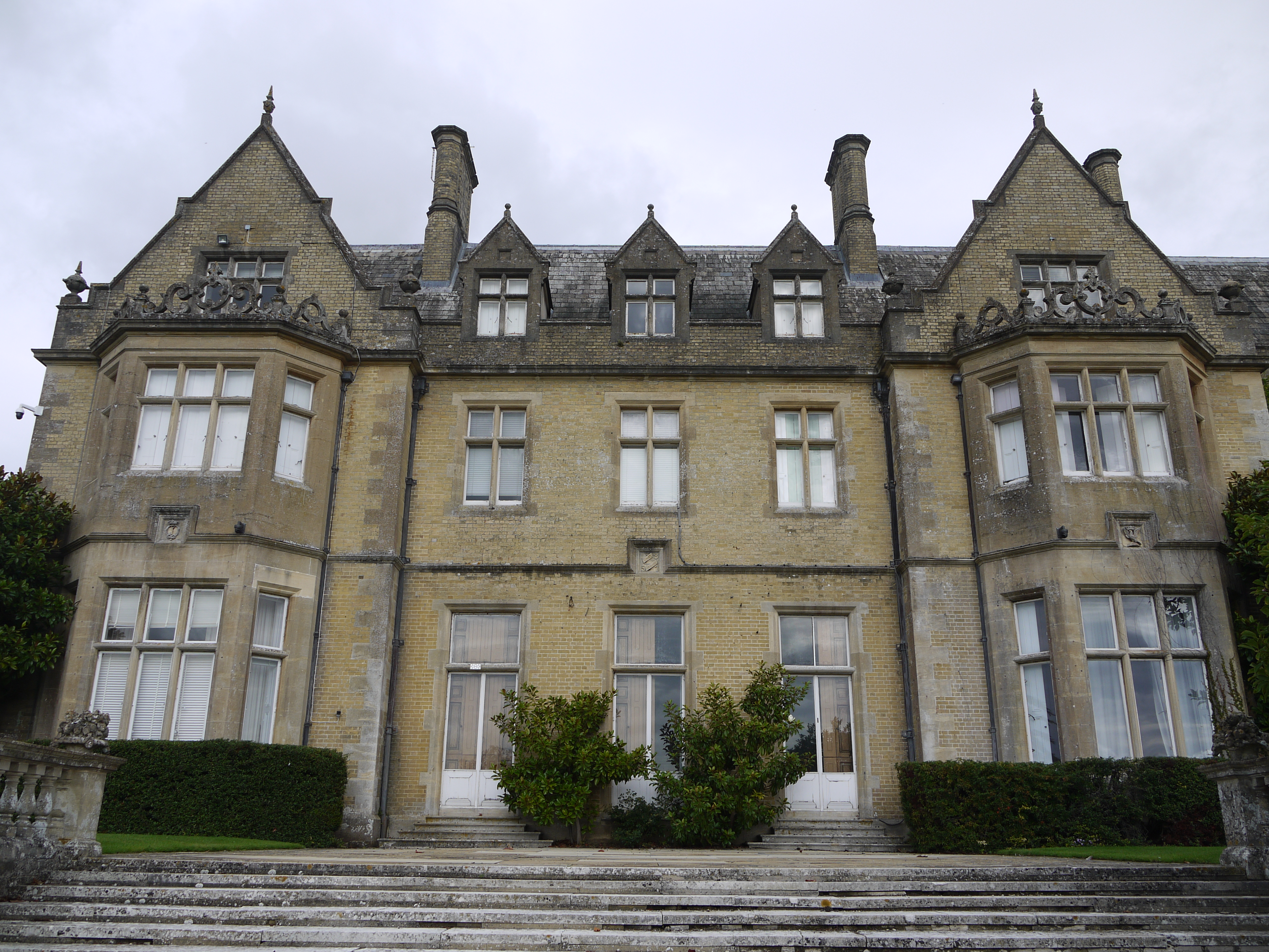 a large stone building with many windows 