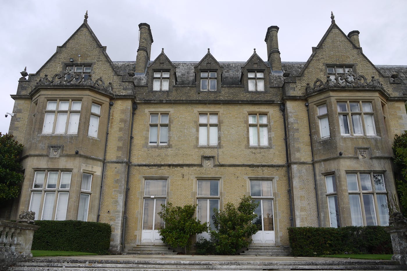 a large stone building with many windows