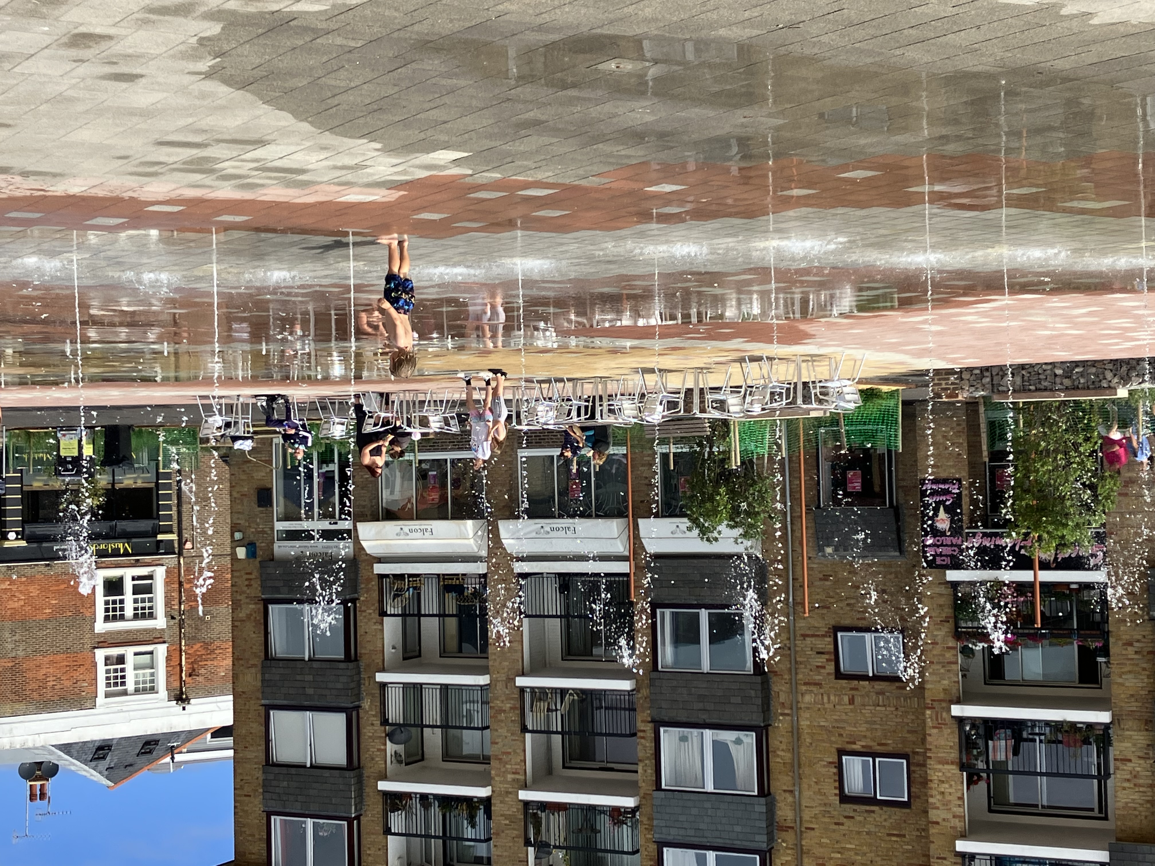 a group of people in a fountain