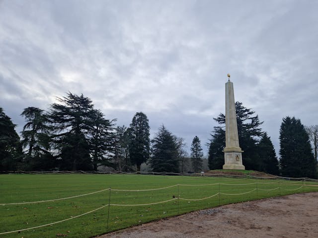 Monument positioned in grass area of park