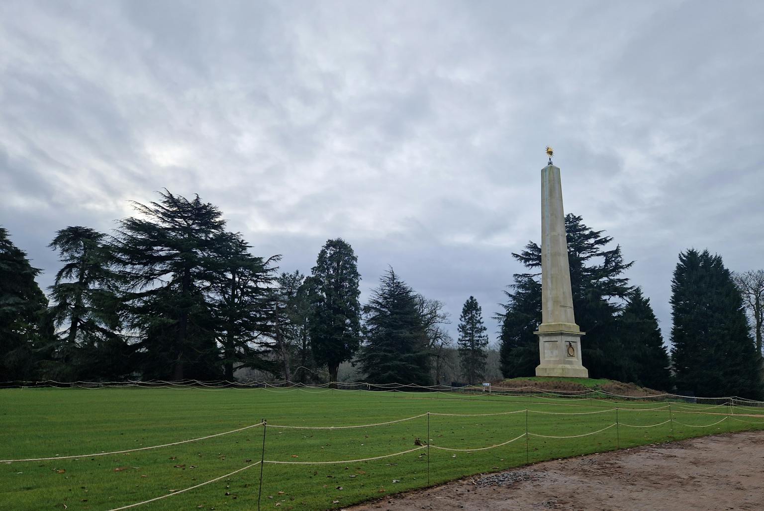 Monument positioned in grass area of park