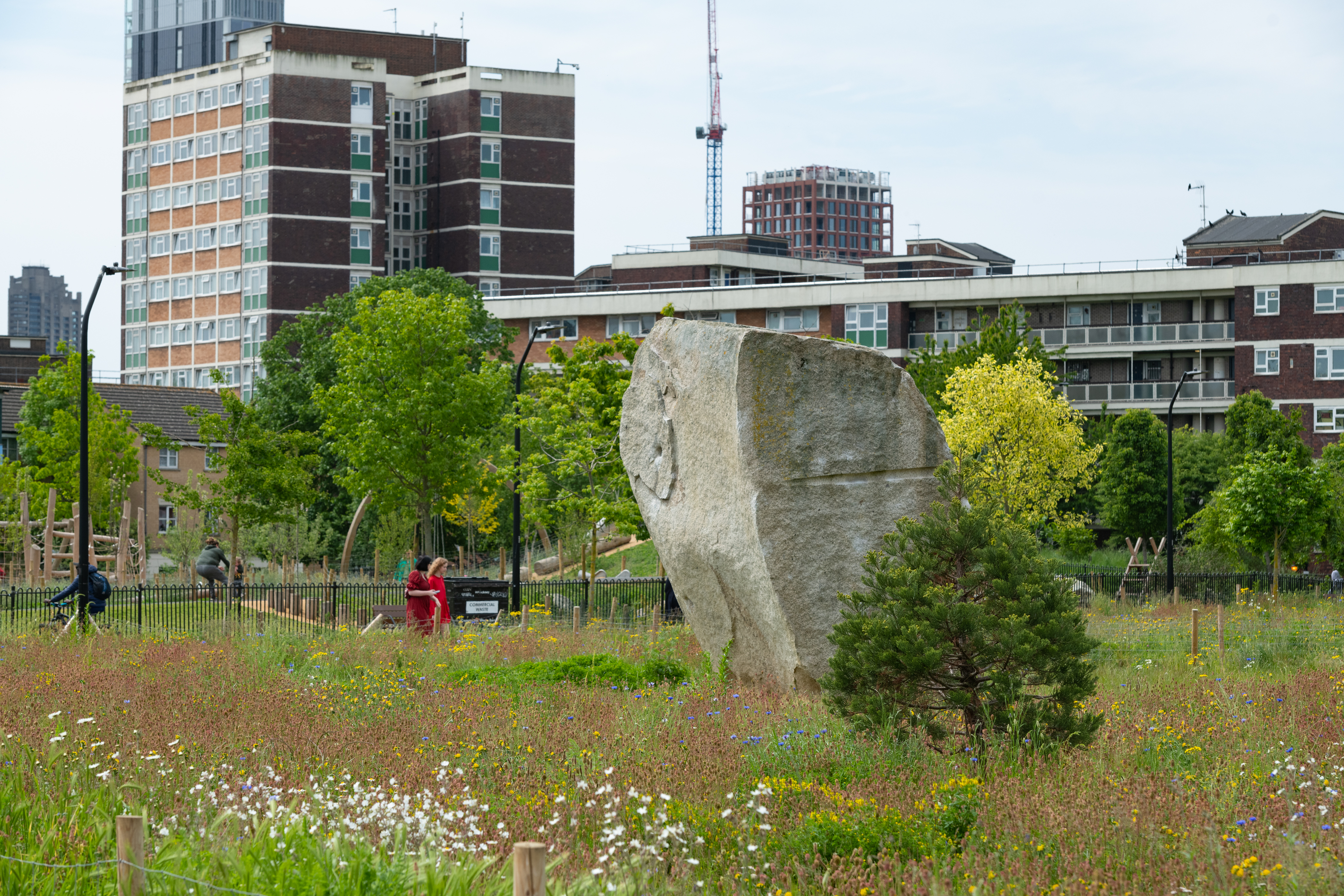 Landscape image of park with stone feature