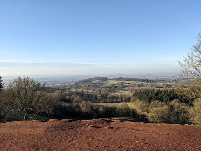 Panoramic view of a scenic landscape from the top of a hill