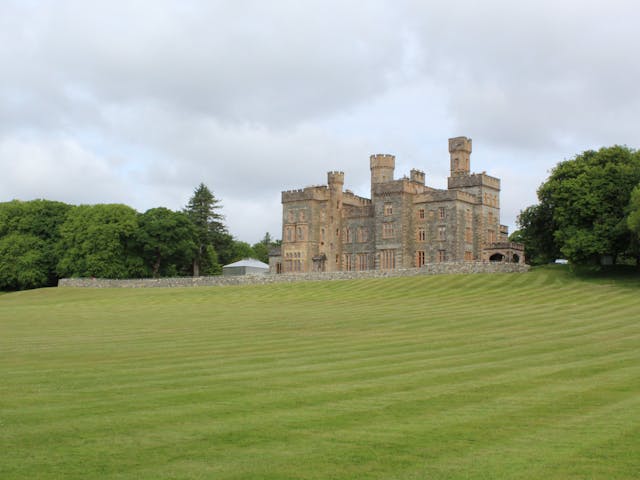 A castle with a lawn