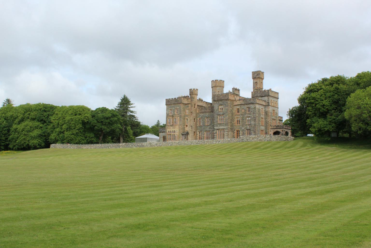 A castle with a lawn
