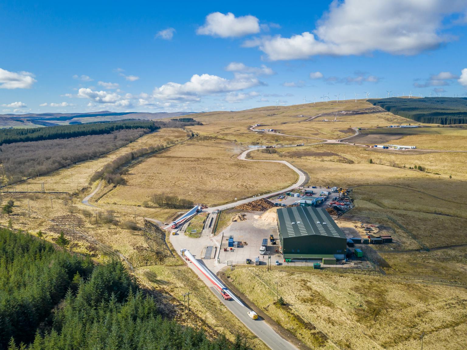 Countryside aerial view with a building and roads