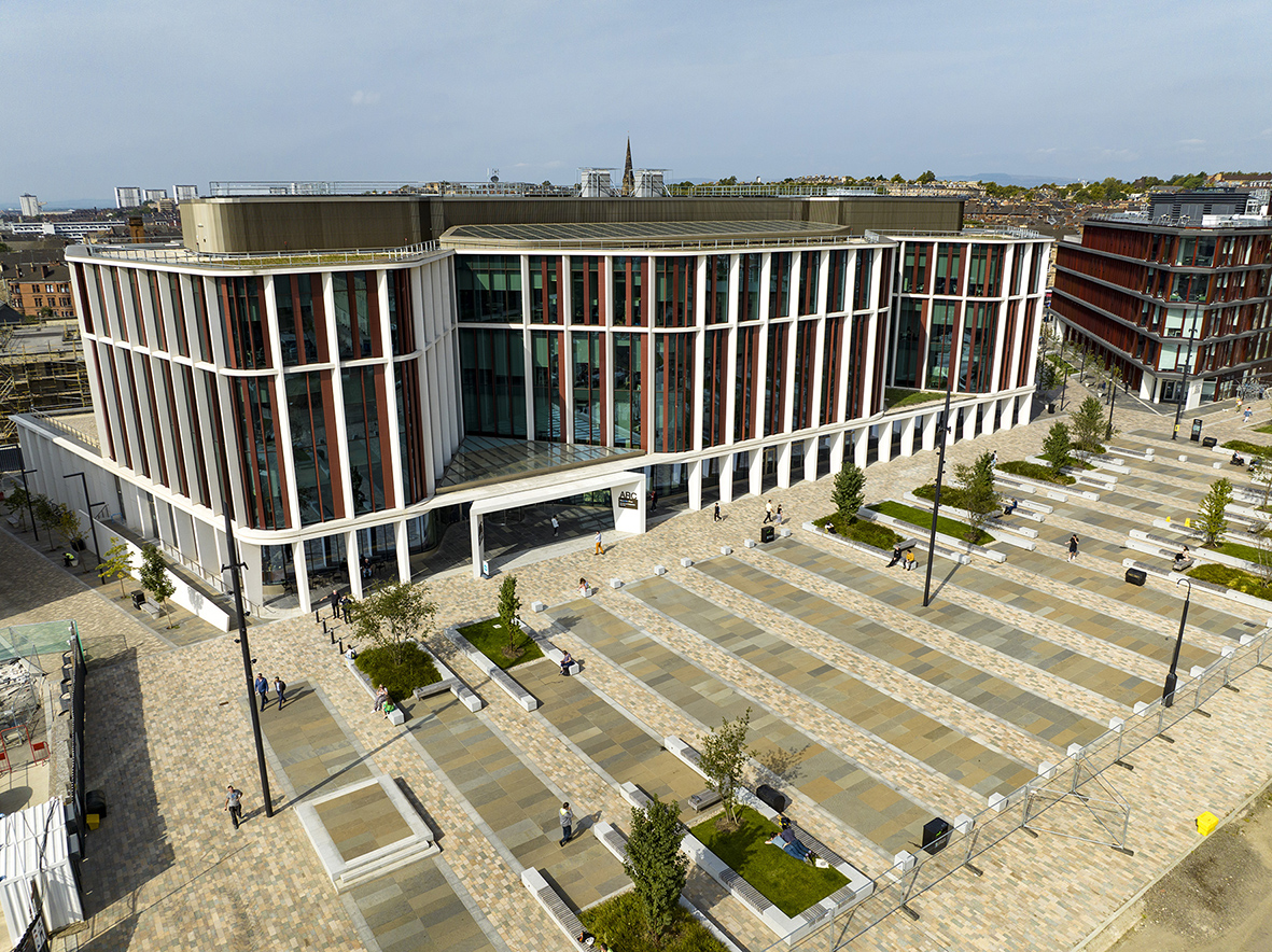 a building with many windows and a courtyard