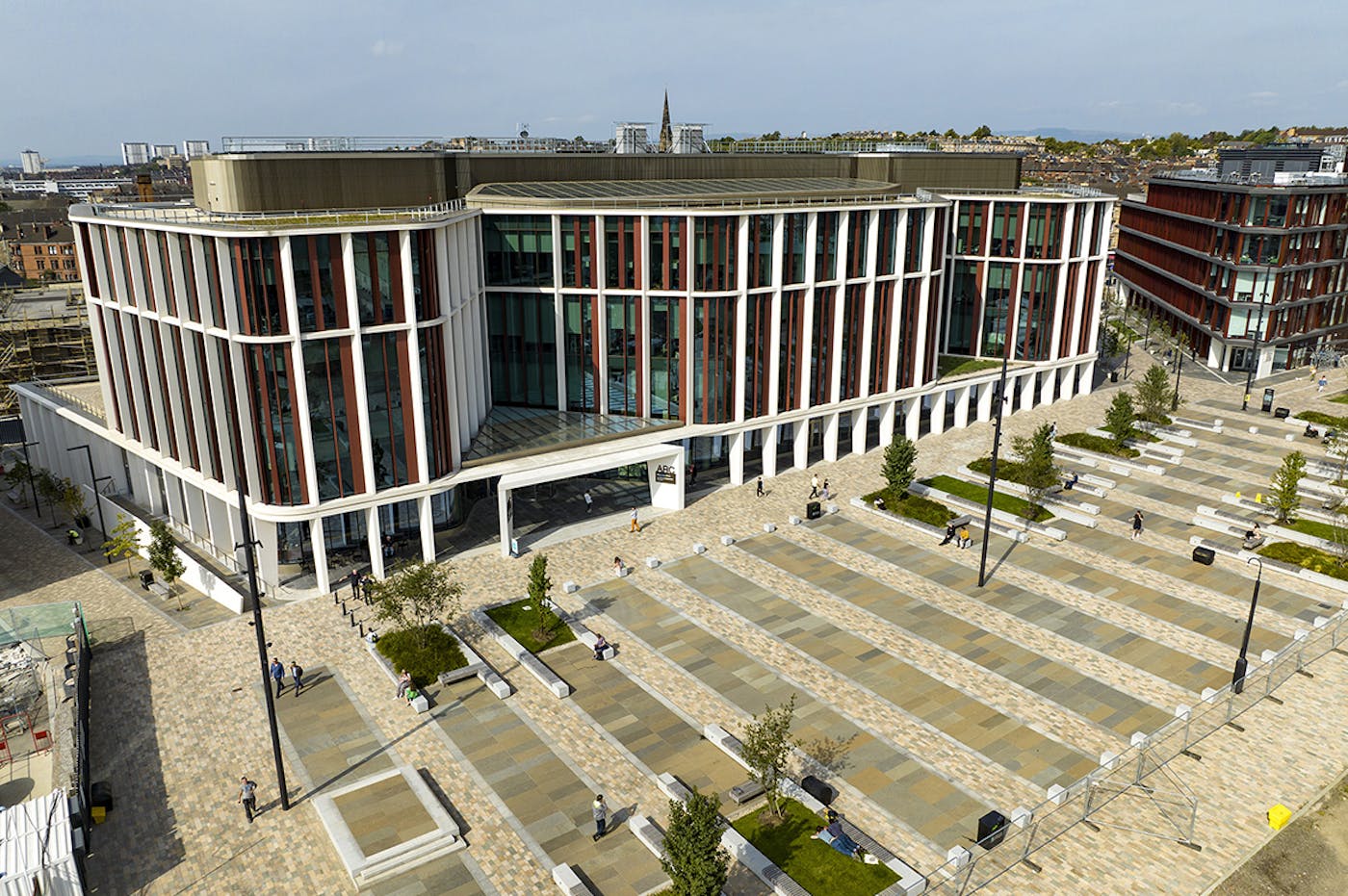 a building with many windows and a courtyard