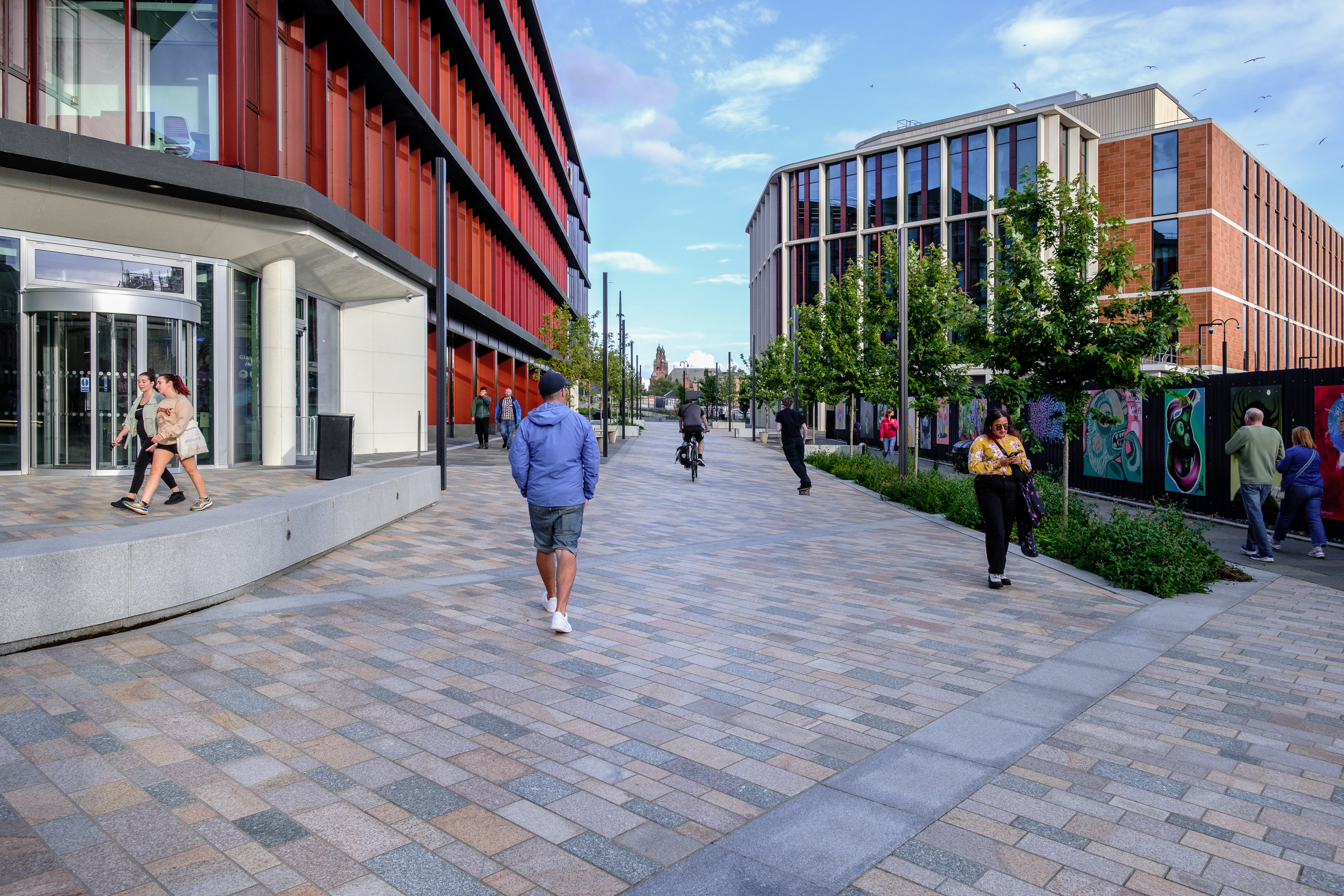 people walking on a pavement
