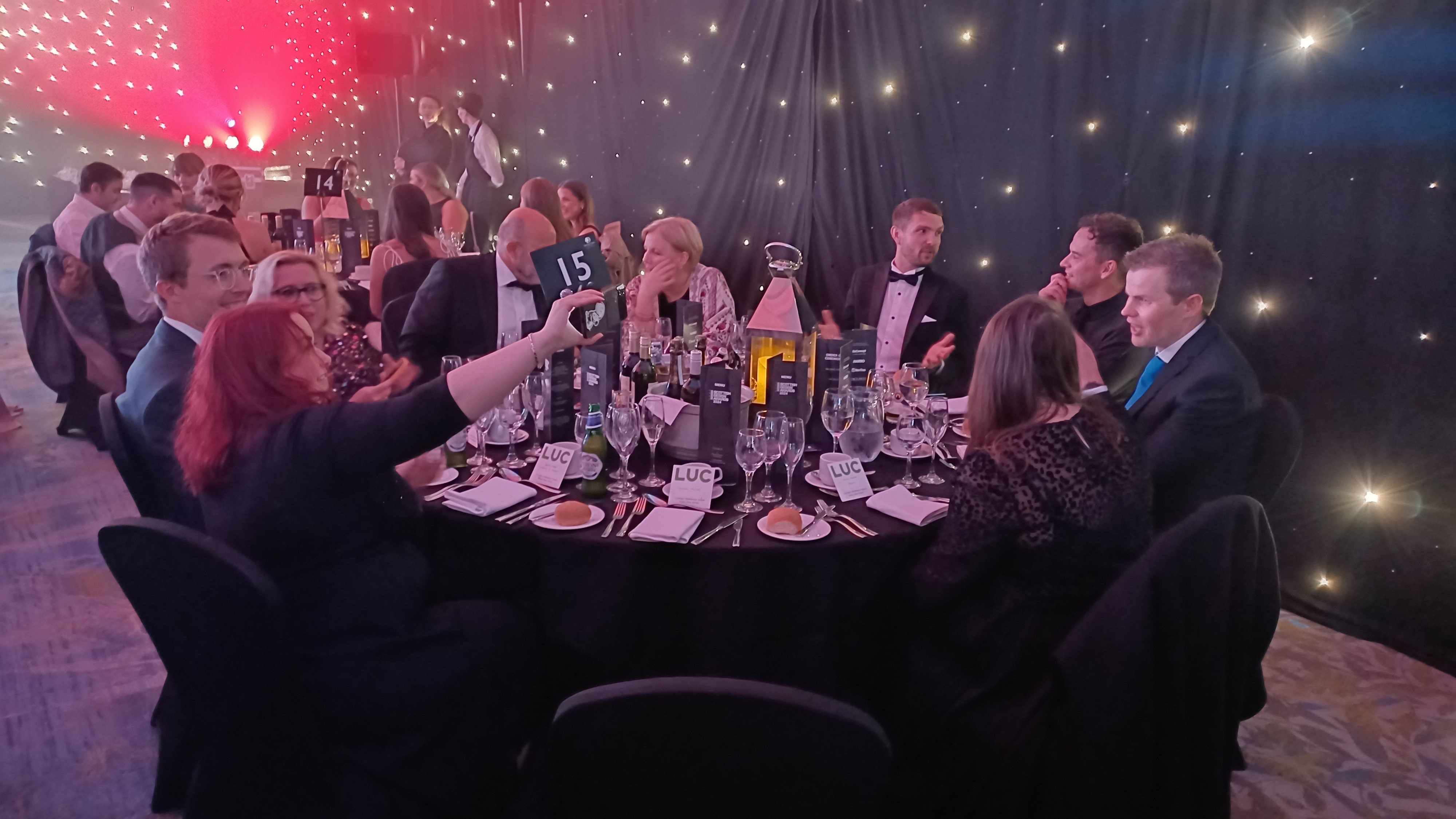 Group of people sitting around table