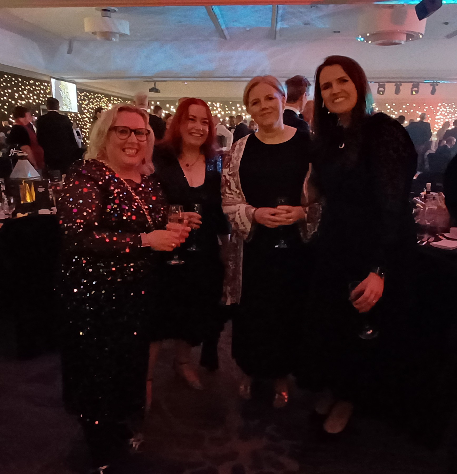 Group of people standing posing for photo