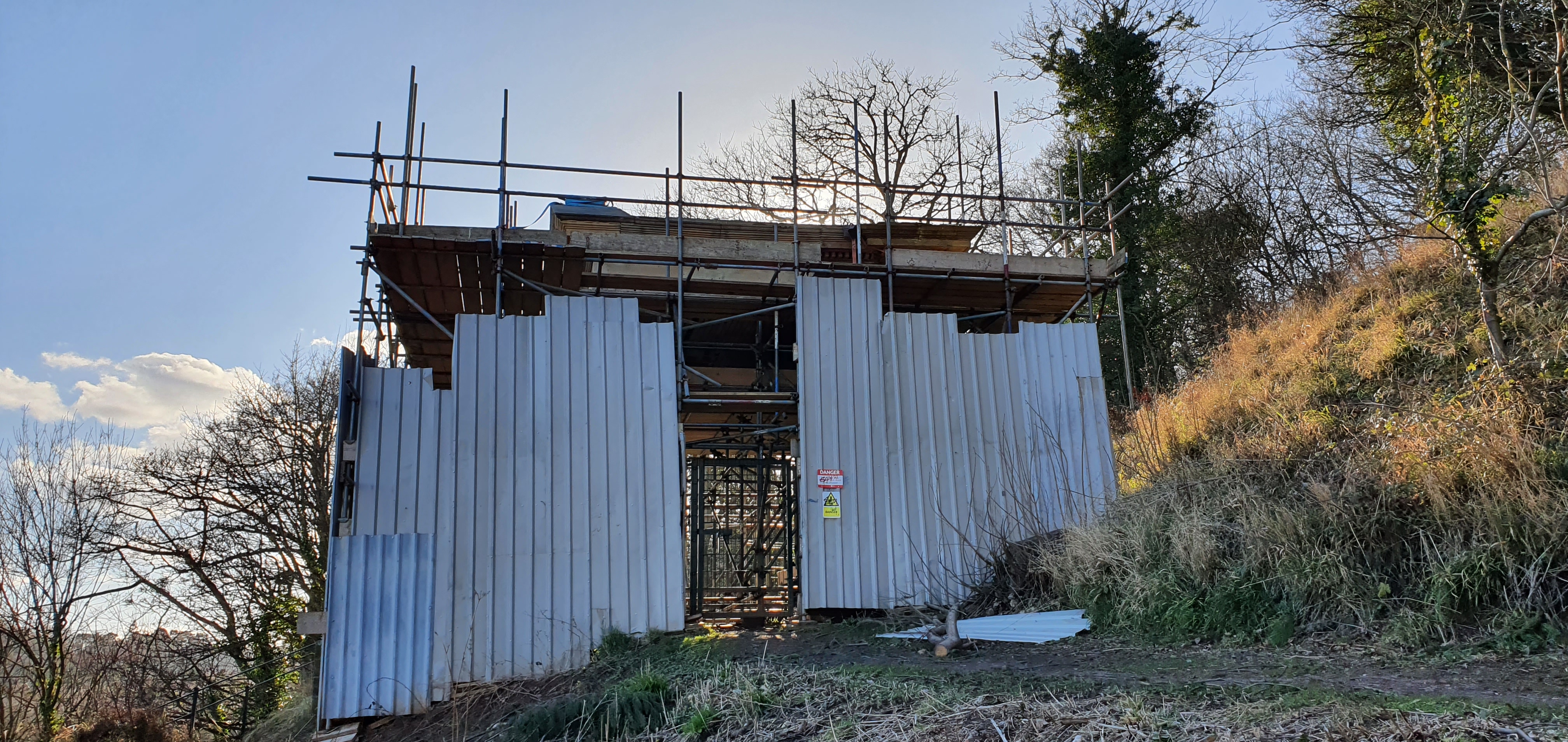 Scaffolding set up around memorial for restoration works
