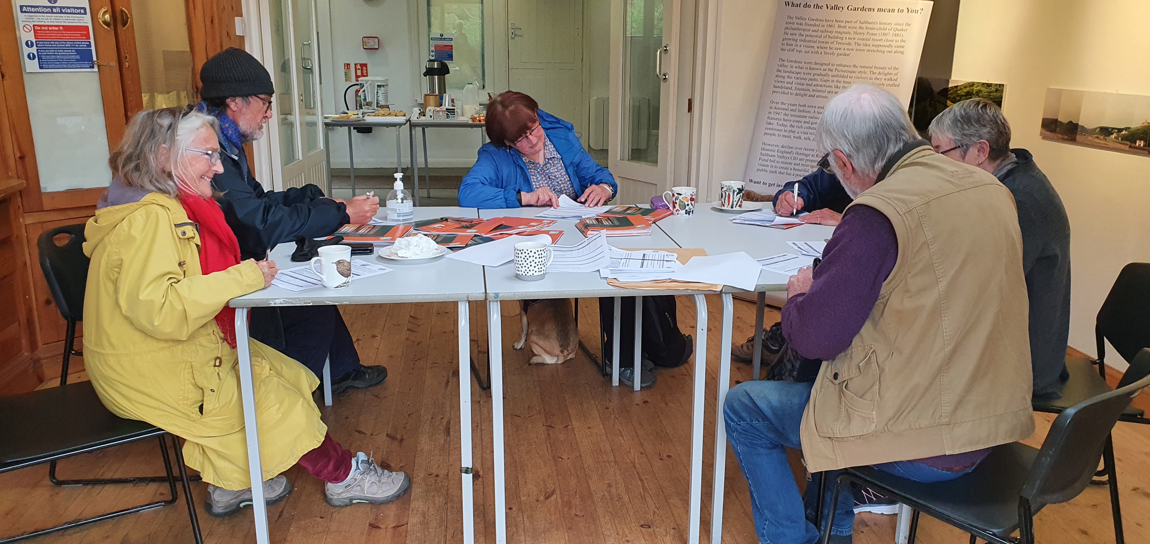 Group of people sitting around a table