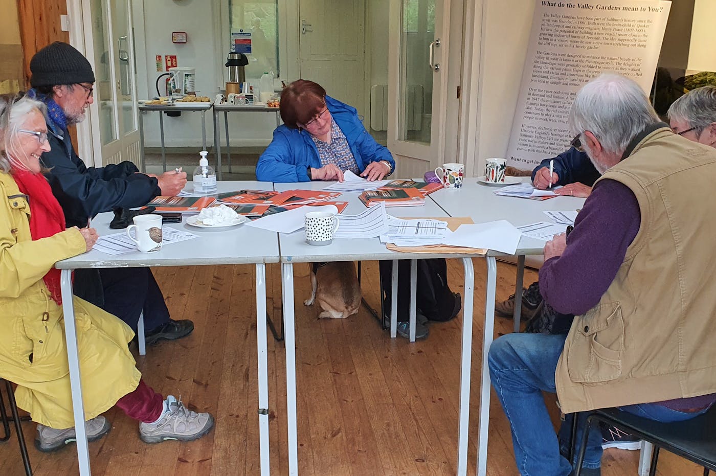 Group of people sitting around a table