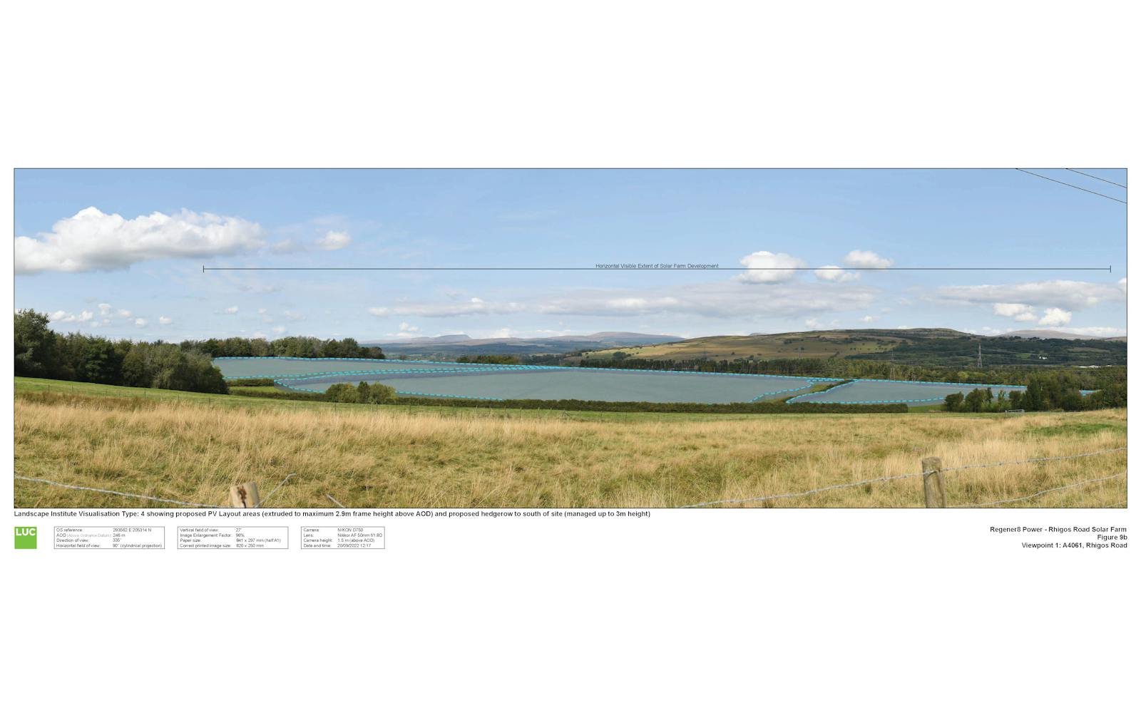 A wide-angle landscape photograph shows a proposed solar farm laid out in a field, with hills in the background. The field in the foreground is covered in long, dry grass.
