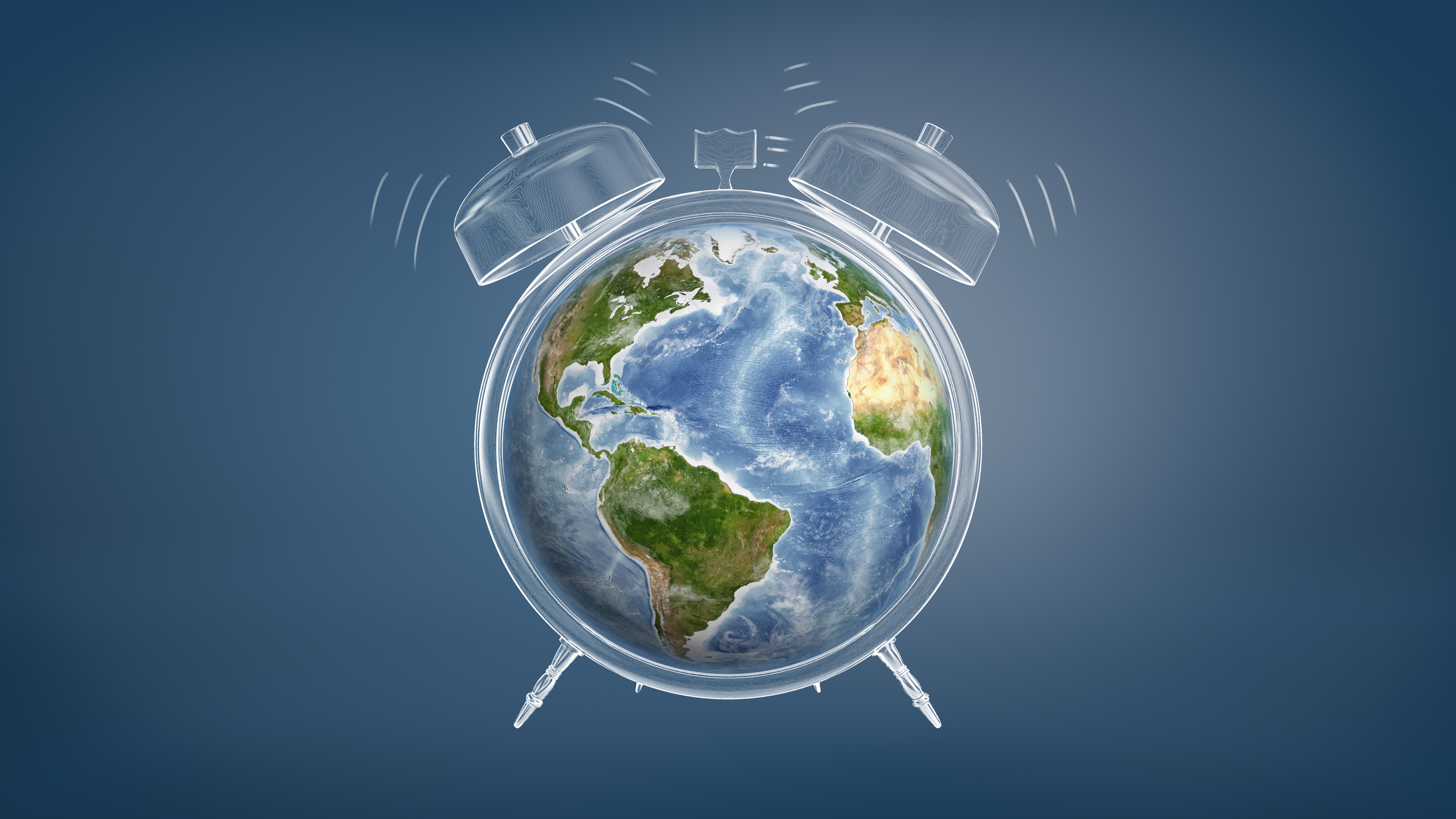 A digital illustration of the Earth depicted as an alarm clock, with ringing bells on top and clock legs at the bottom, symbolising urgency and a wake-up call for the planet.