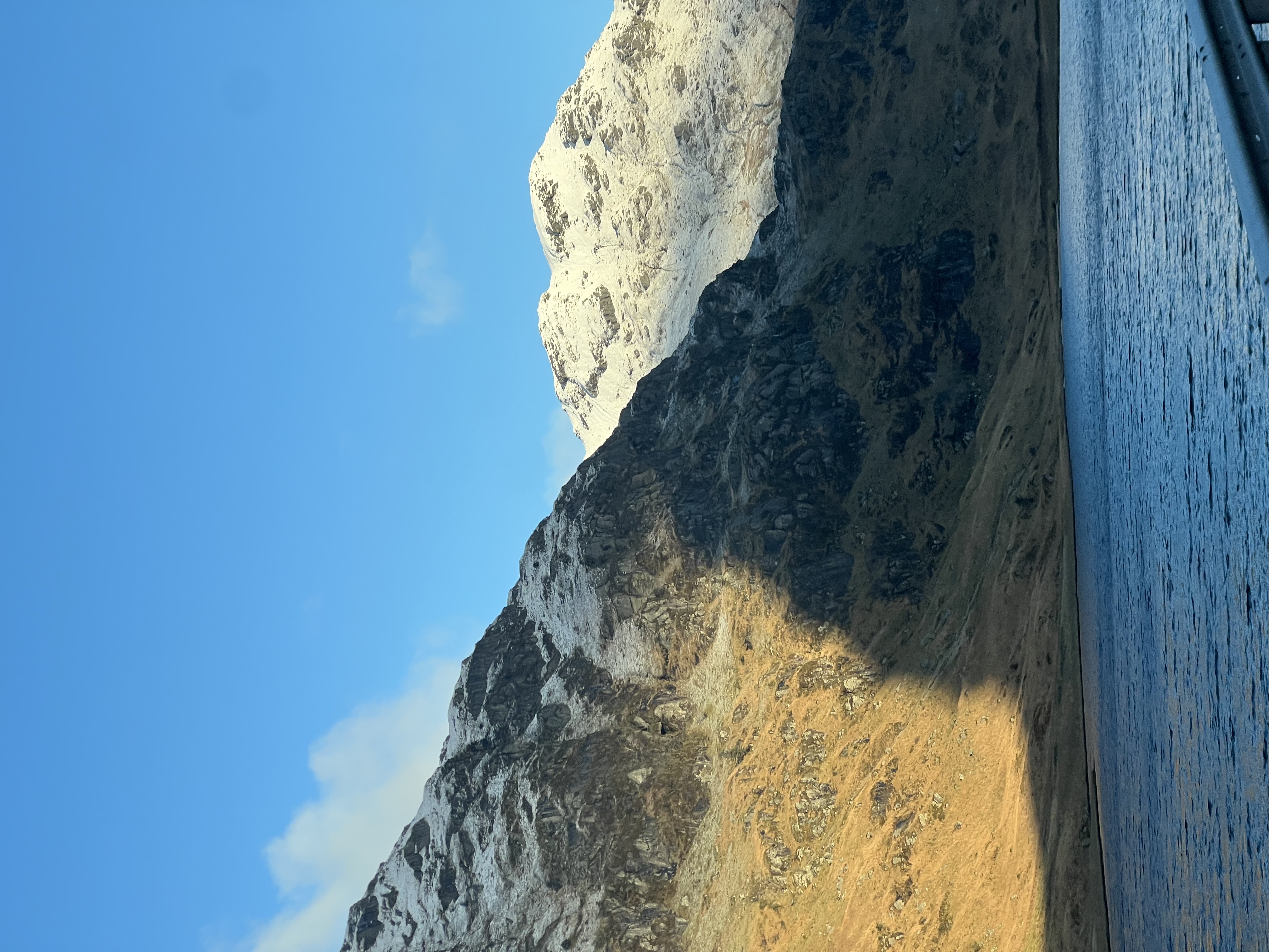 Lochan at the base of a snowy Scottish Munroe.