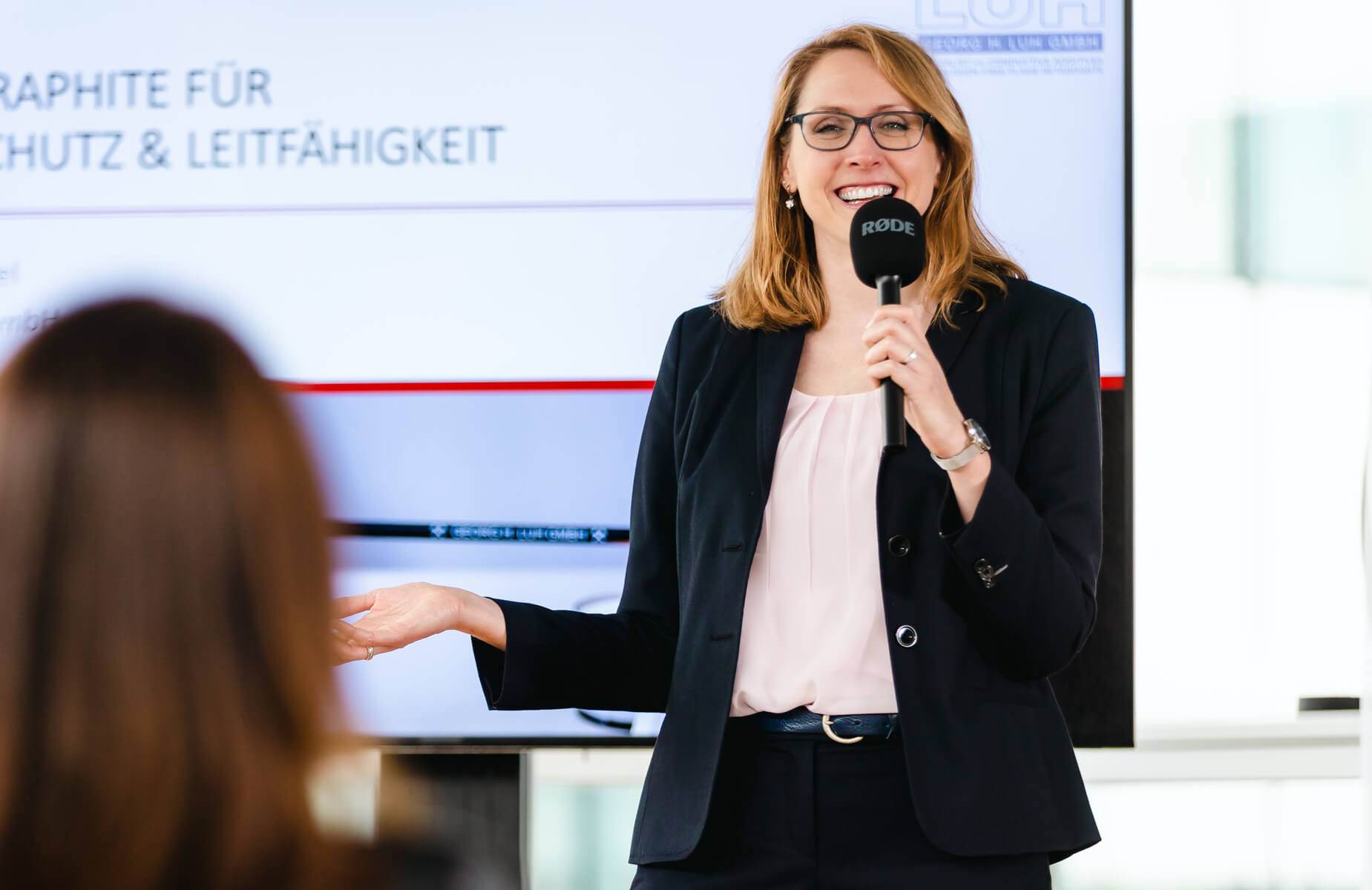 Angelina Schöffel, expert in flame retardancy, gives a talk about flame protection in industry