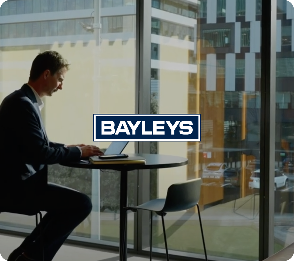 Man sitting at desk on laptop