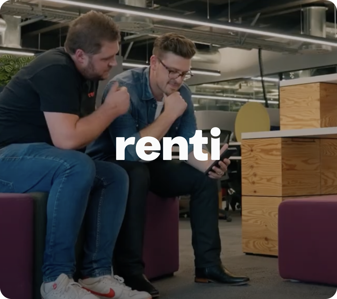 Two men sitting on office furniture, looking at a smartphone together, with the word “renti” overlaid in bold text.