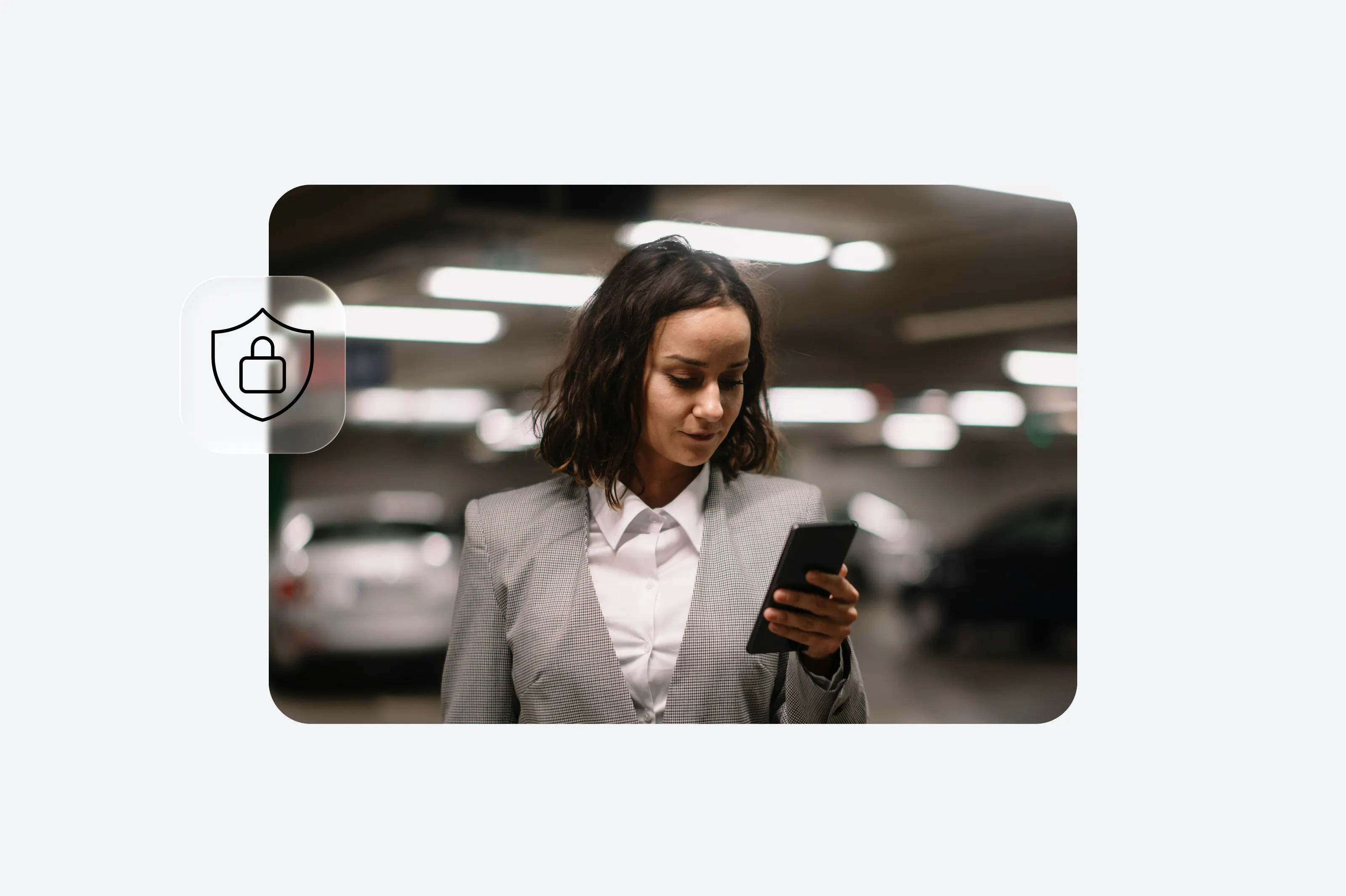 A businesswoman looking at her smartphone