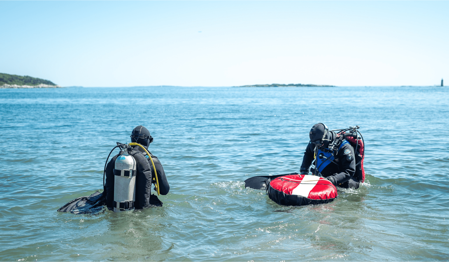 Members of the Running Tide team doing dive work in Maine.