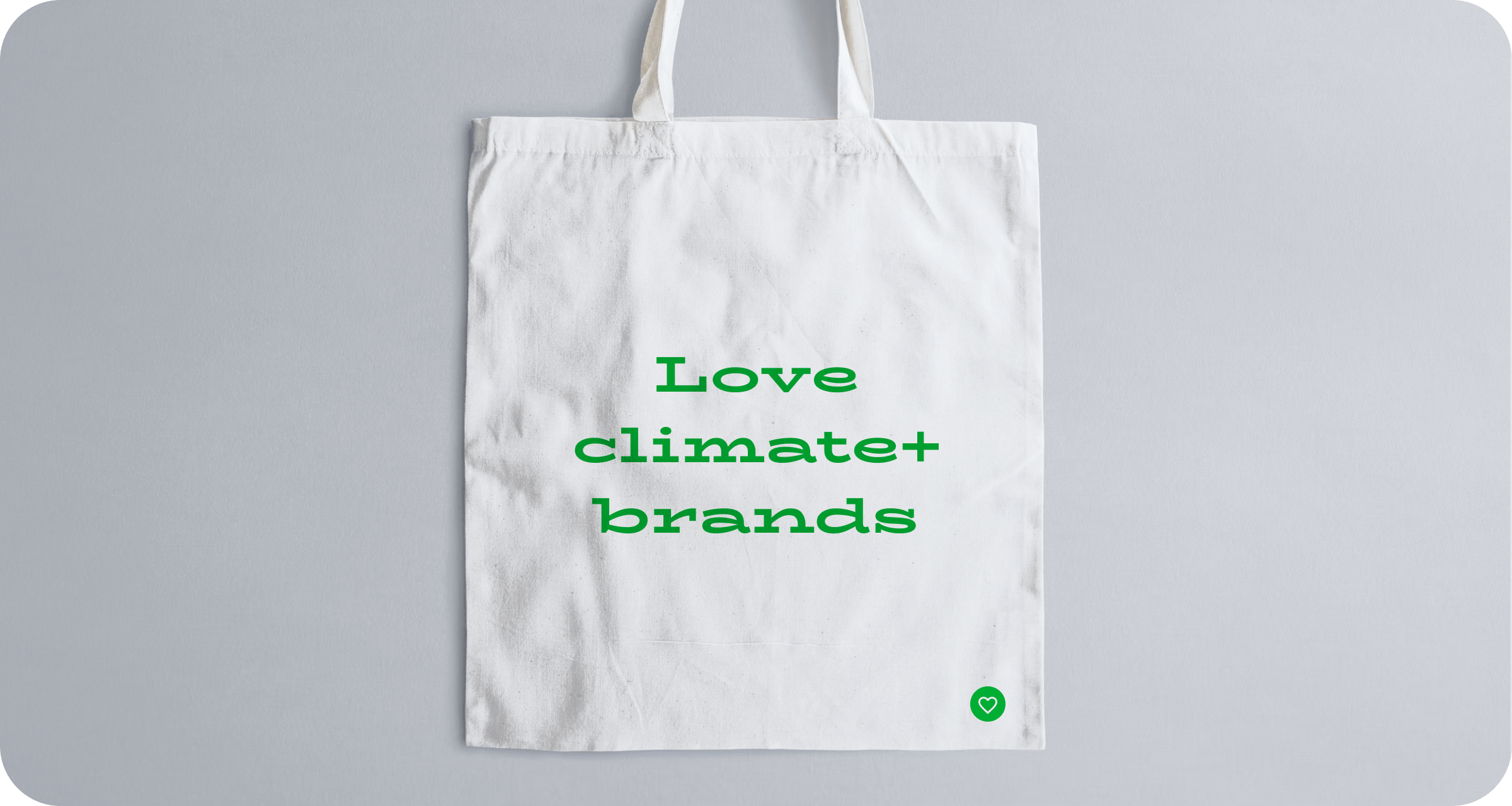 a tote bag reading 'love climate+ brands'