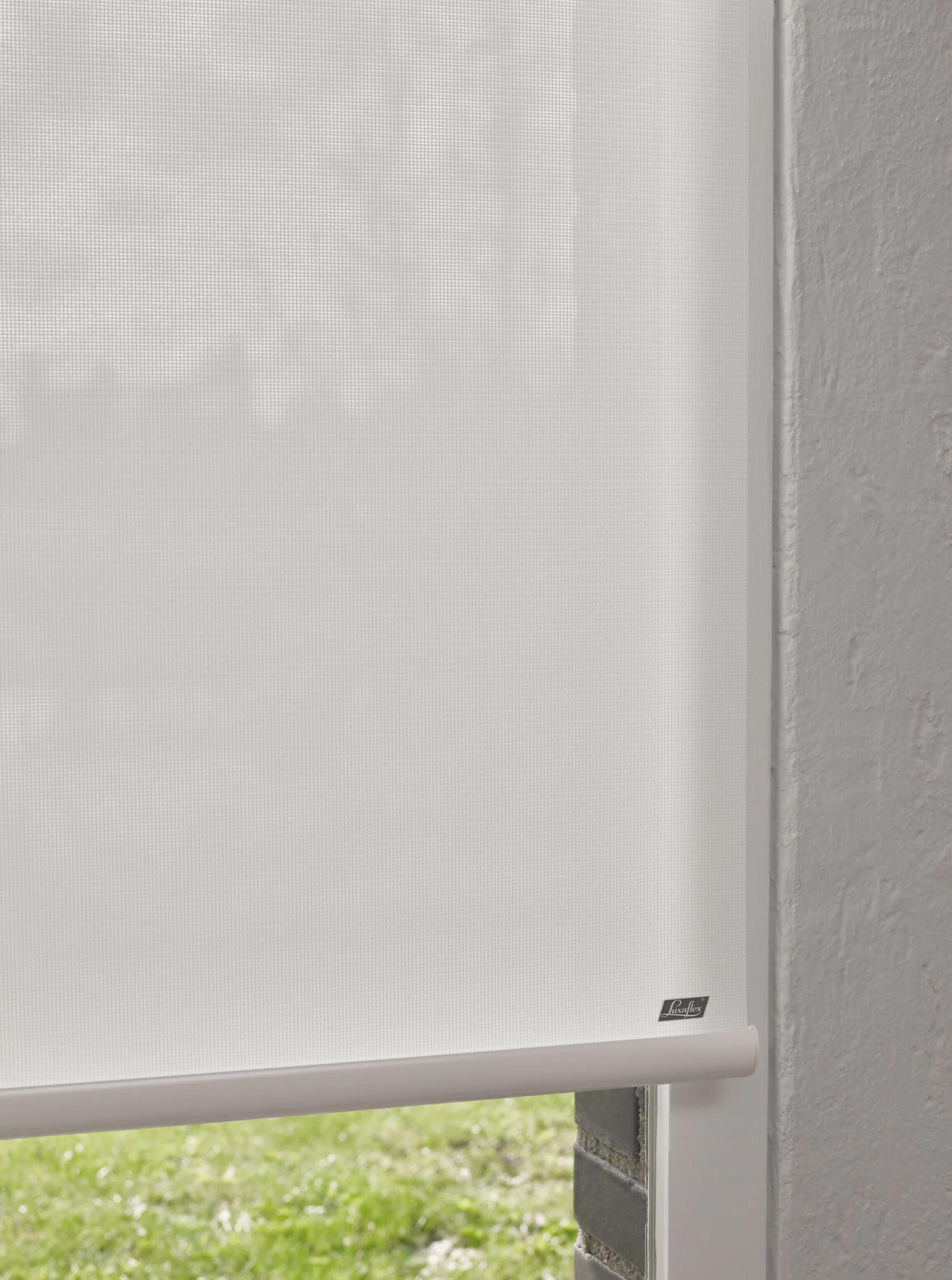 Closeup of white roller blinds 