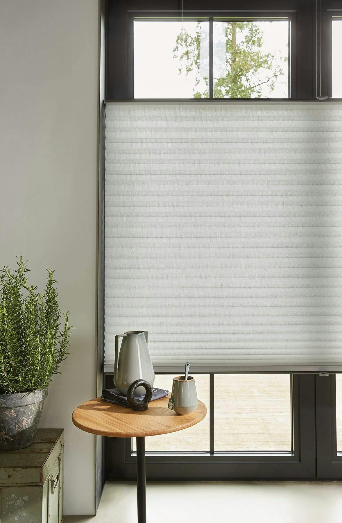 White Duette® blinds in a light room