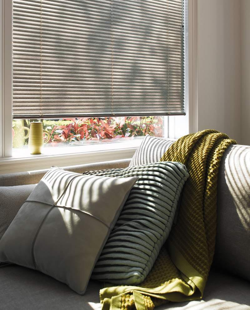 living room with grey venetian blinds