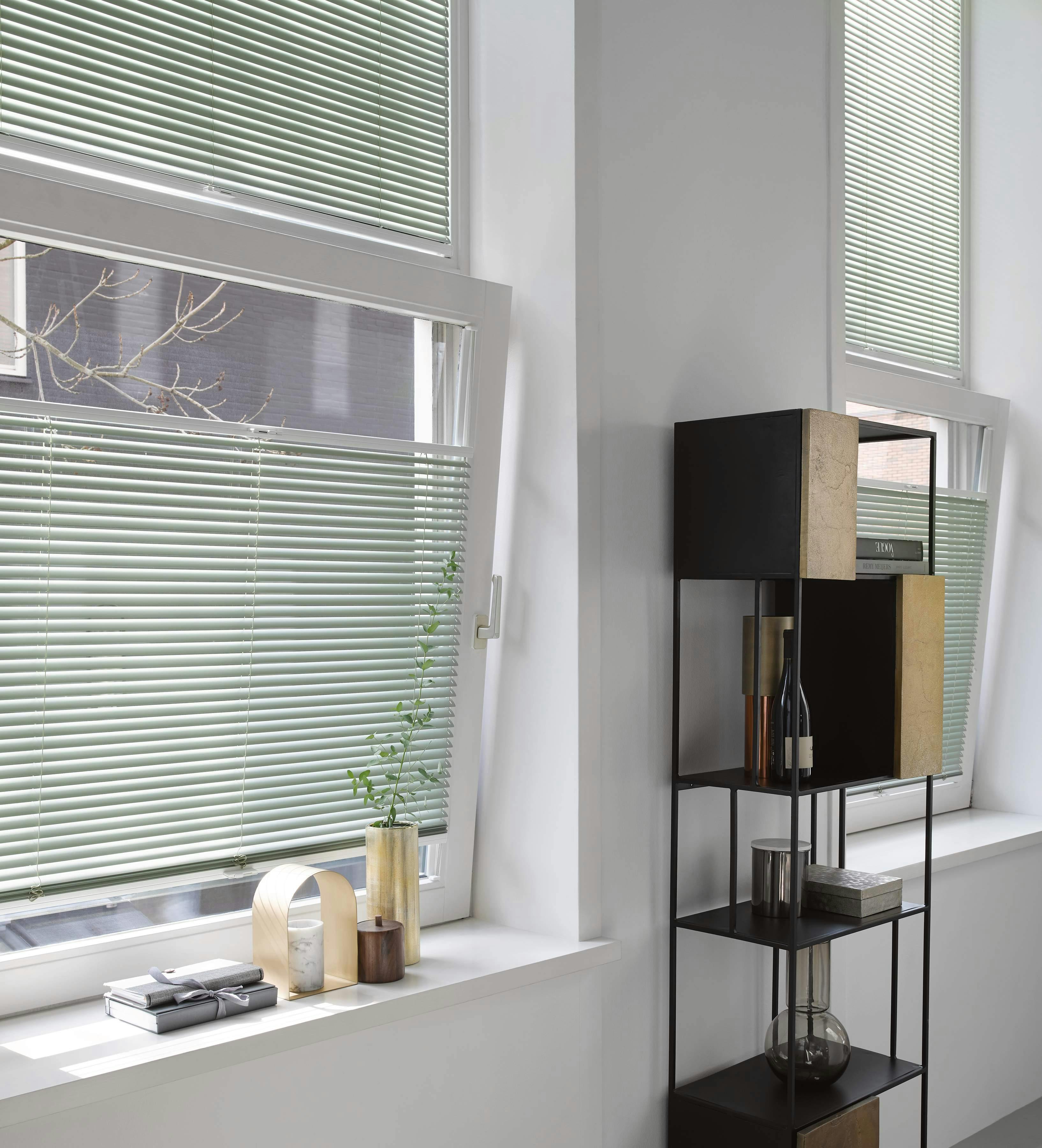 Tilt and turn green Venetian blinds