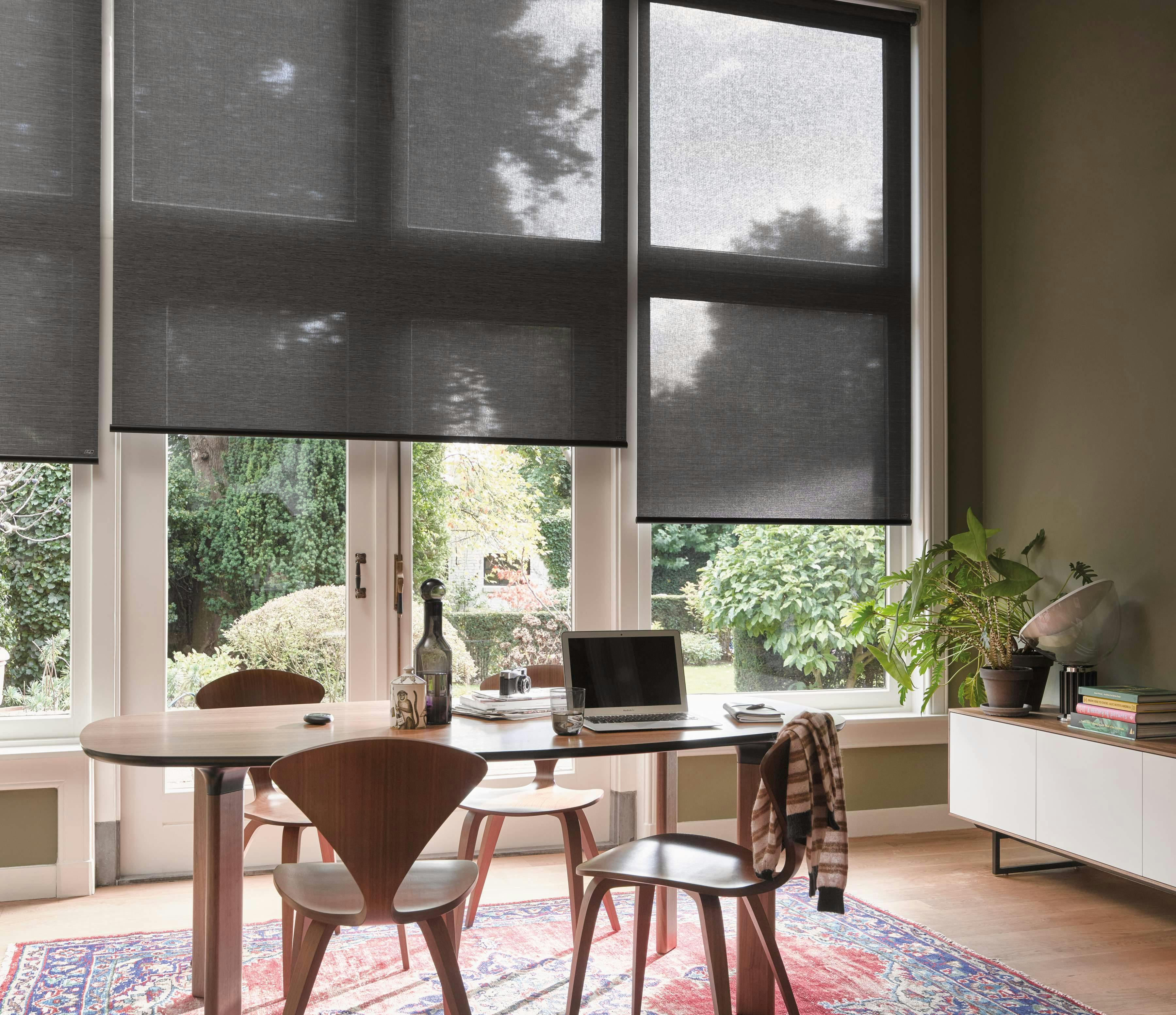 Dining room with black Roller blinds