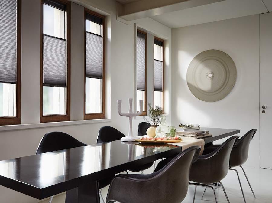 dining room with black Duette® blinds