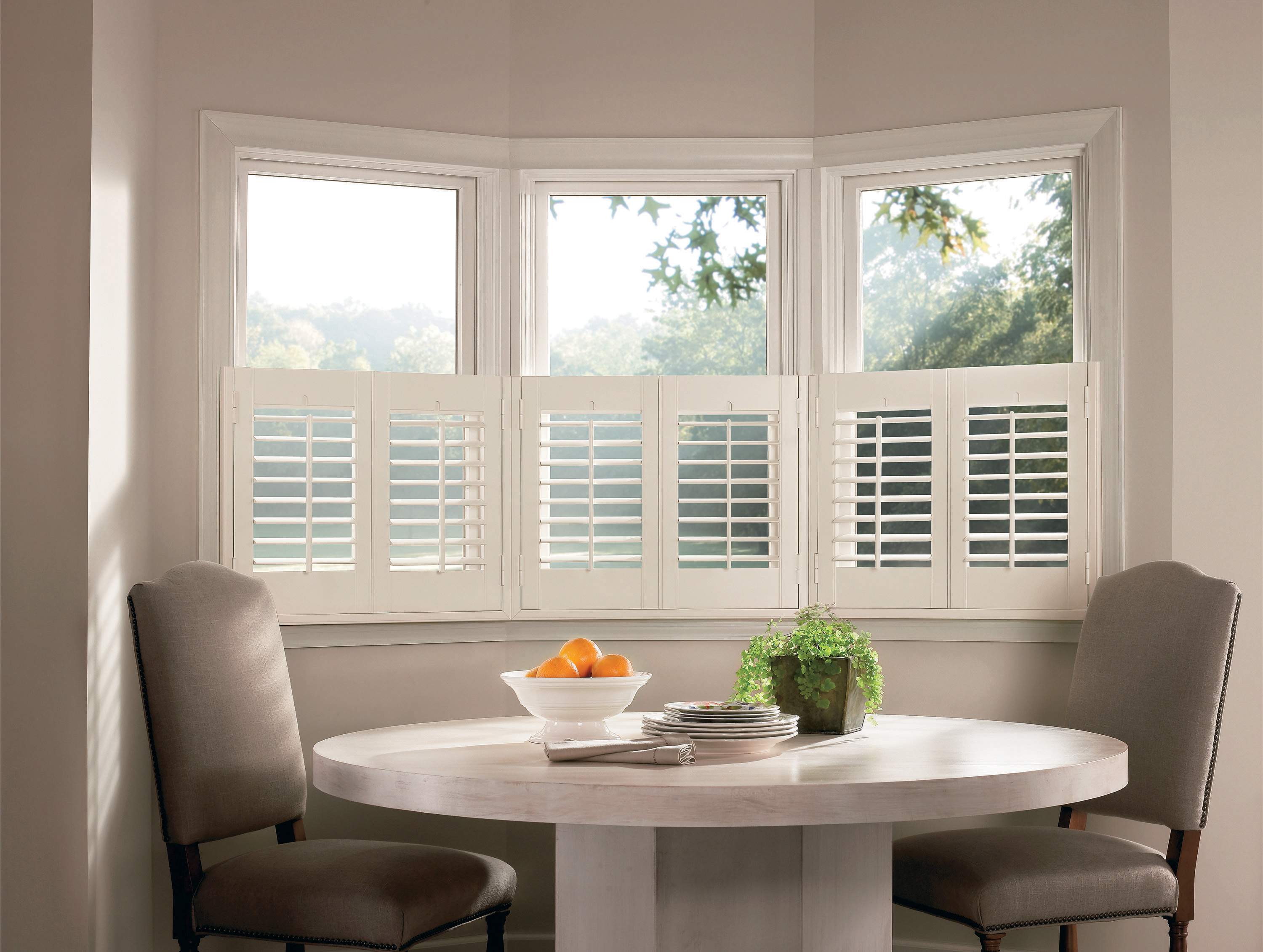 Dining nook with white cafe Shutters