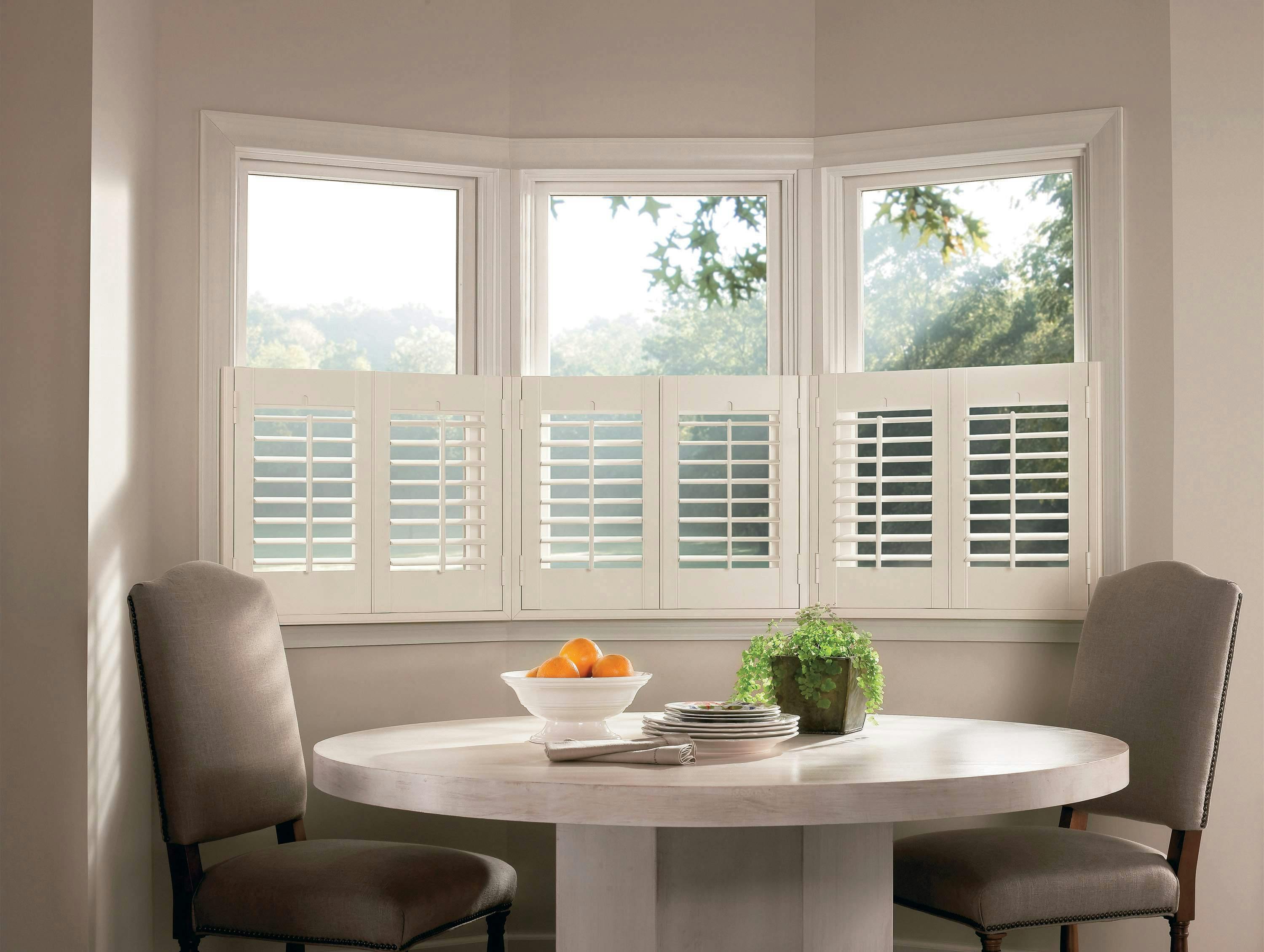 Dining nook with white cafe Shutters