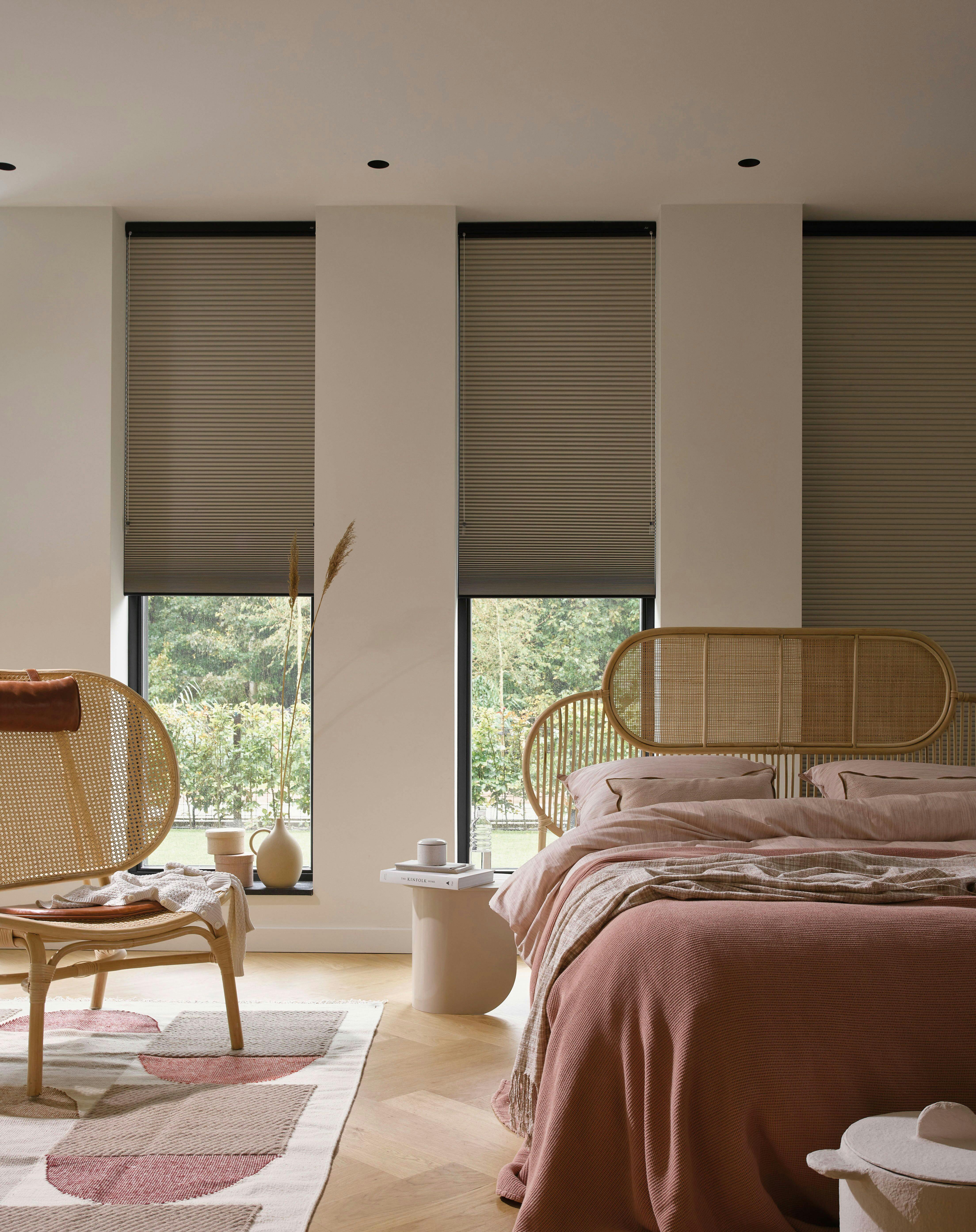 pink bedroom with grey duette shades 