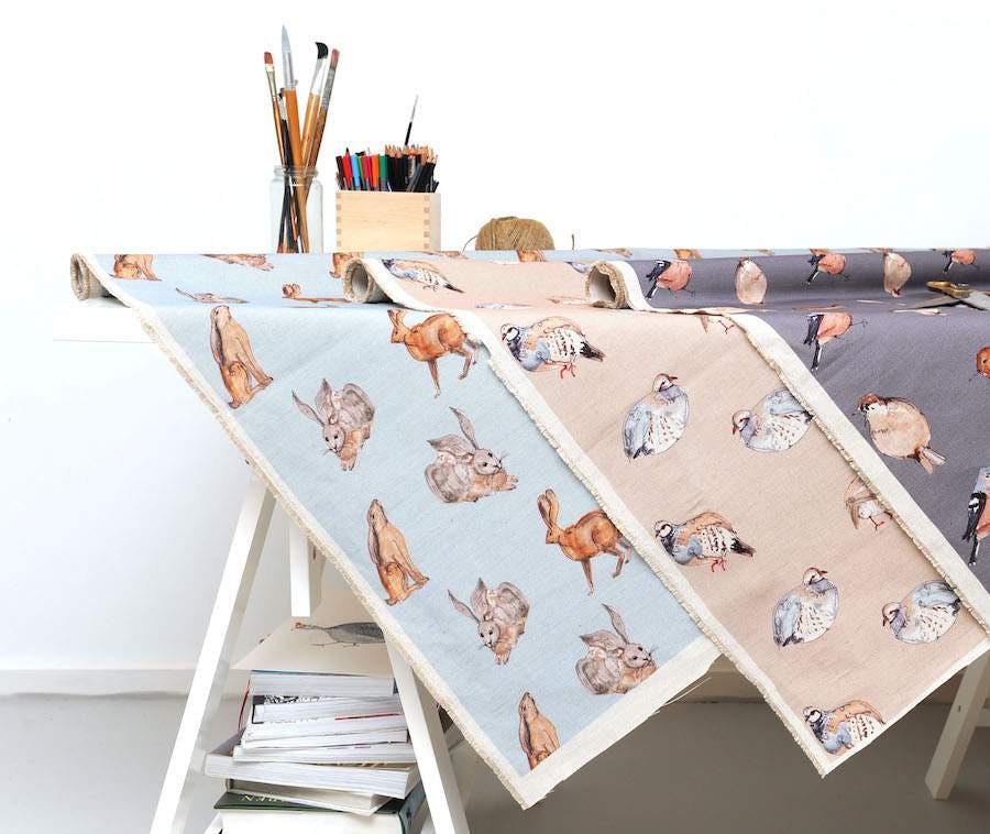 Fabrics of various colours with animal designs on them