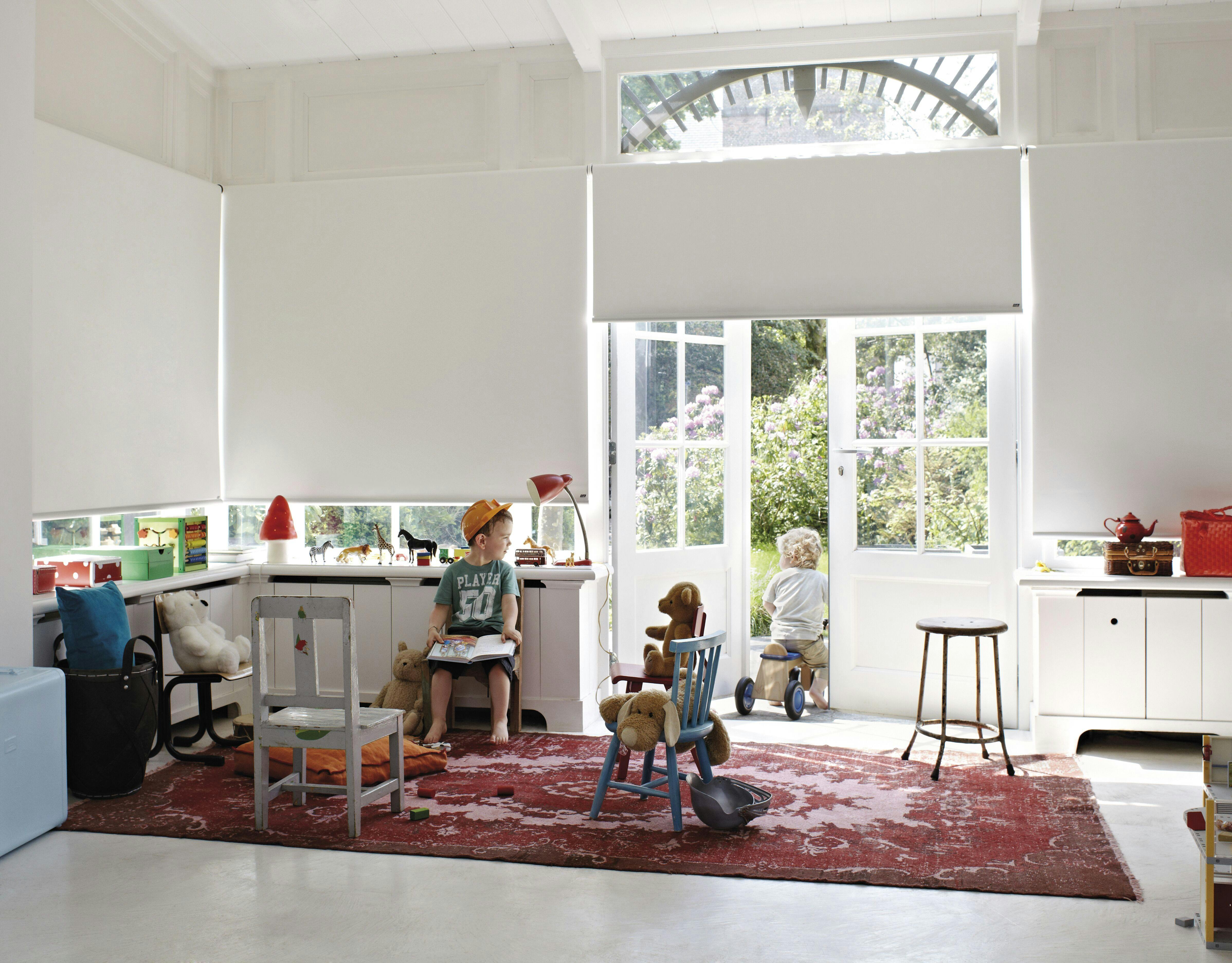 kids room with white roller blinds