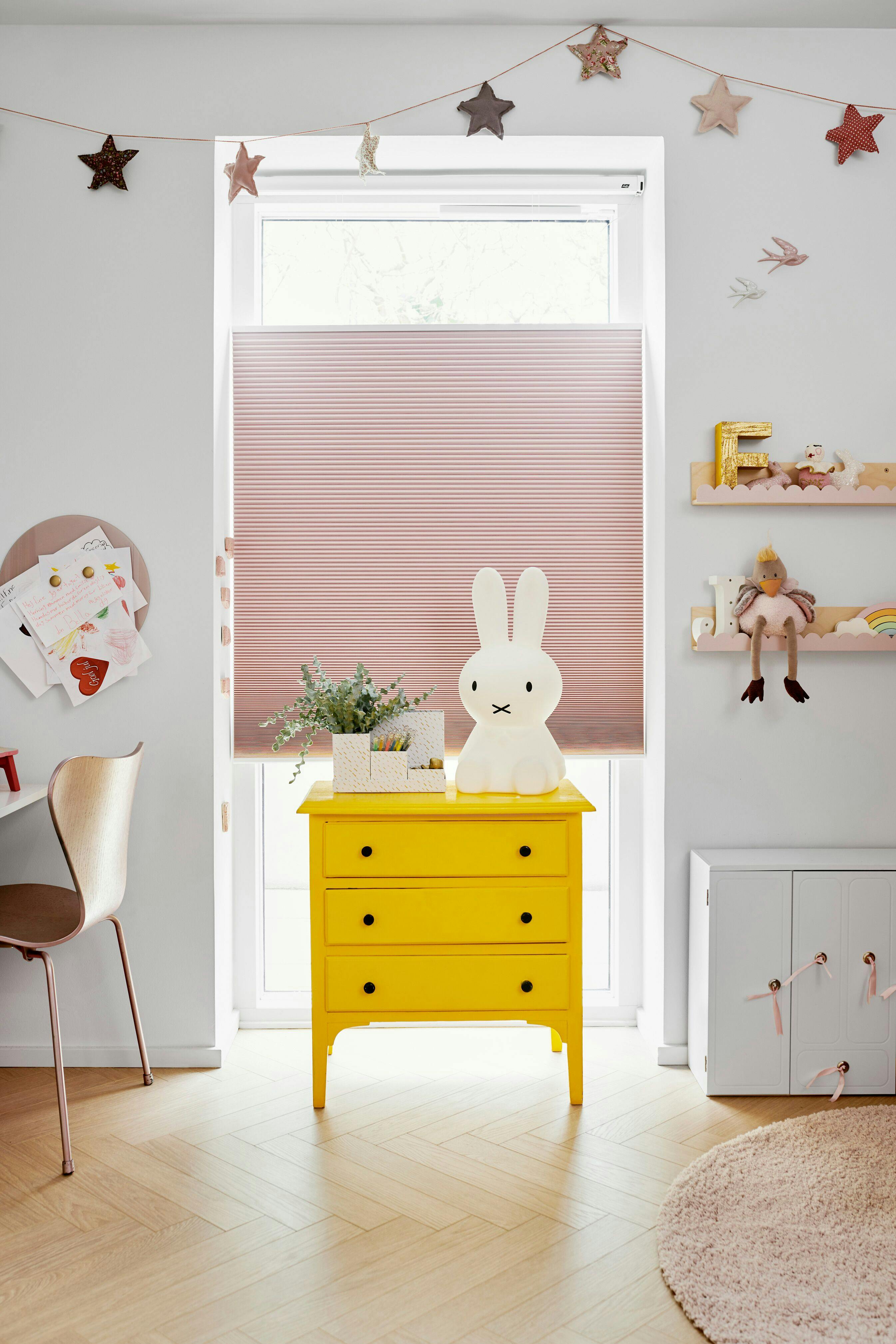 Kids' room with pink Duette® blinds