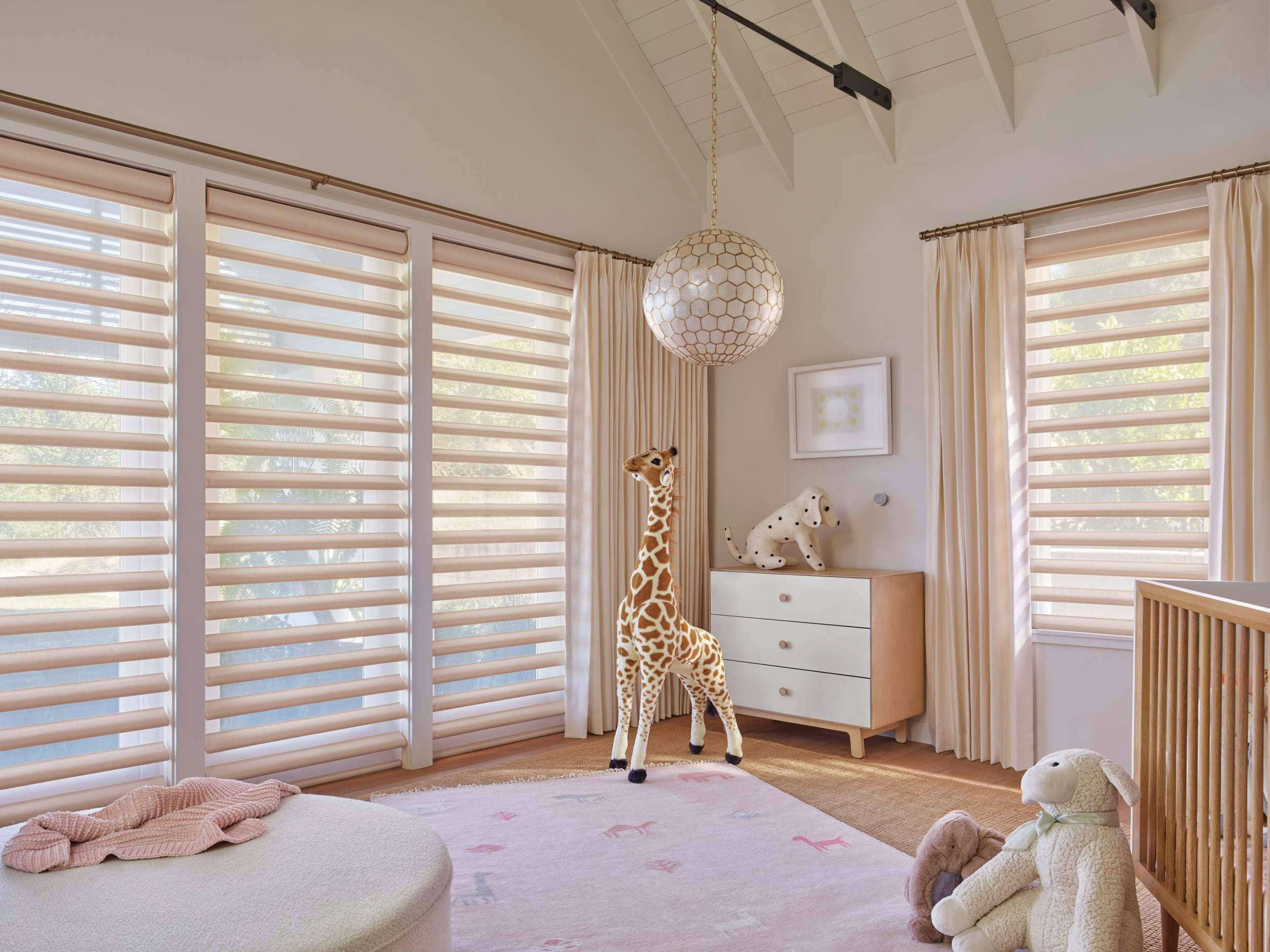 Kids room with cream Pirouette® shades
