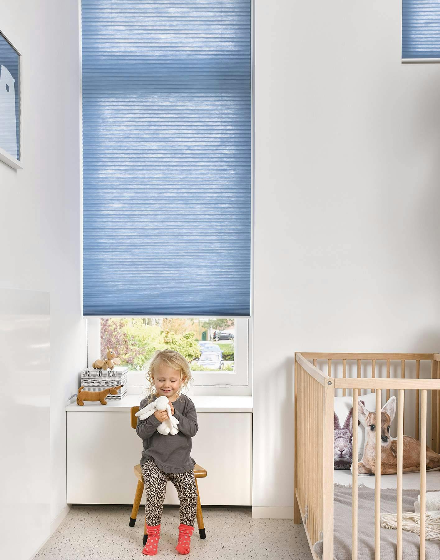 kids room with blue duette shades
