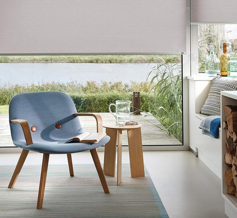 Modern living room with grey Roller blinds