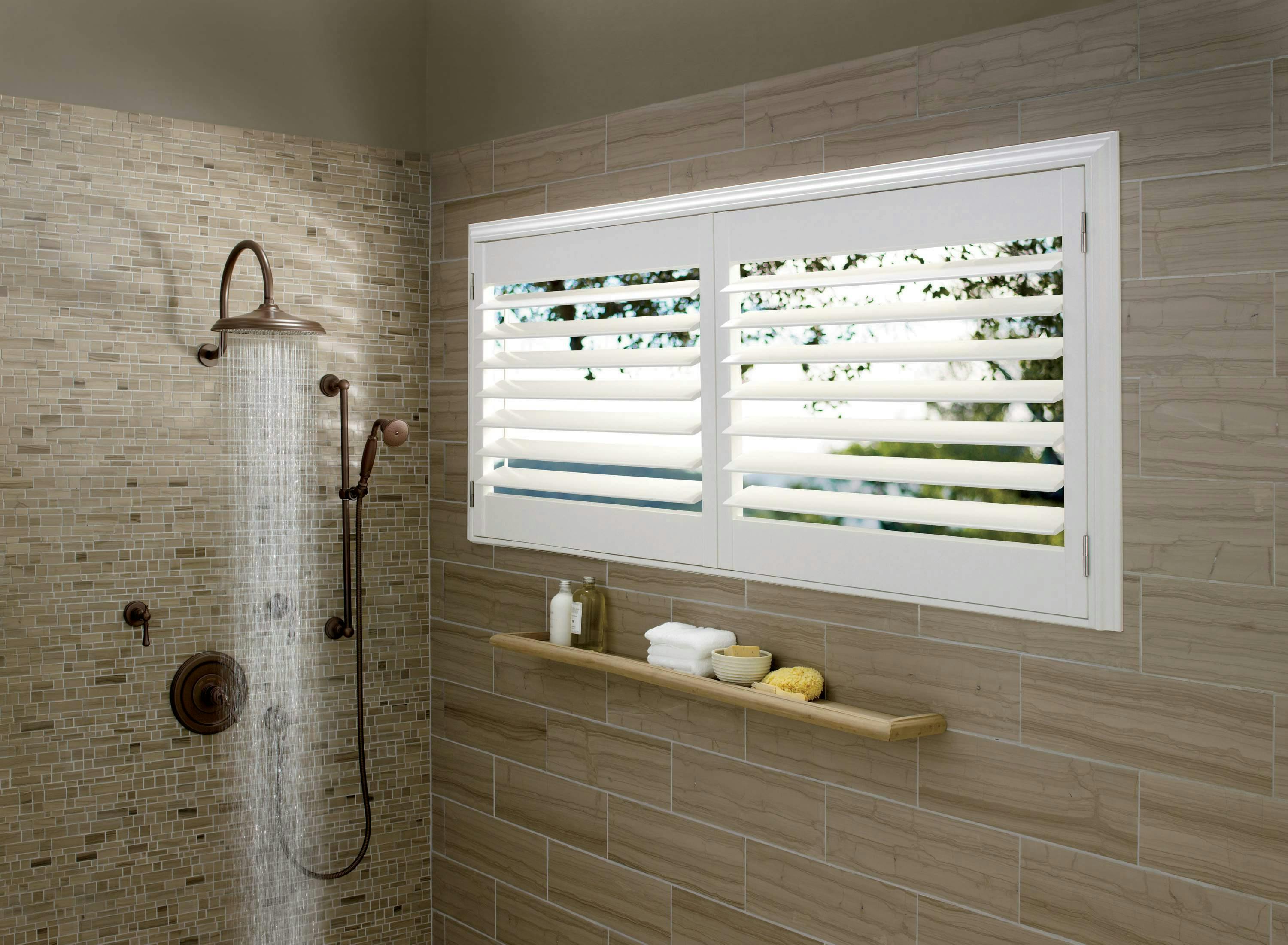 White shutters on a bathroom window