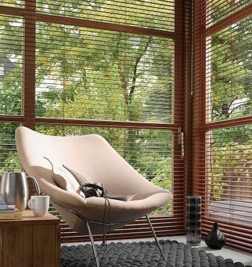 warm living room with brown venetian blinds