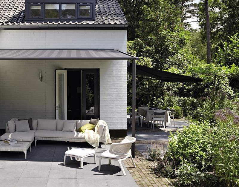 Outdoor garden with stripe black patio awning