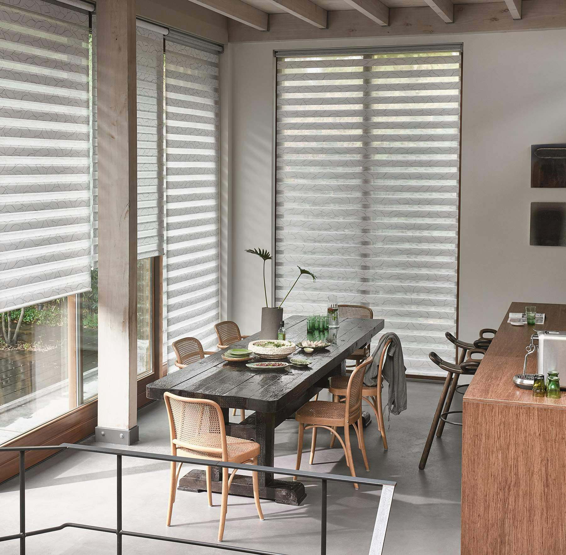 Modern dining room with white Duo roller blinds