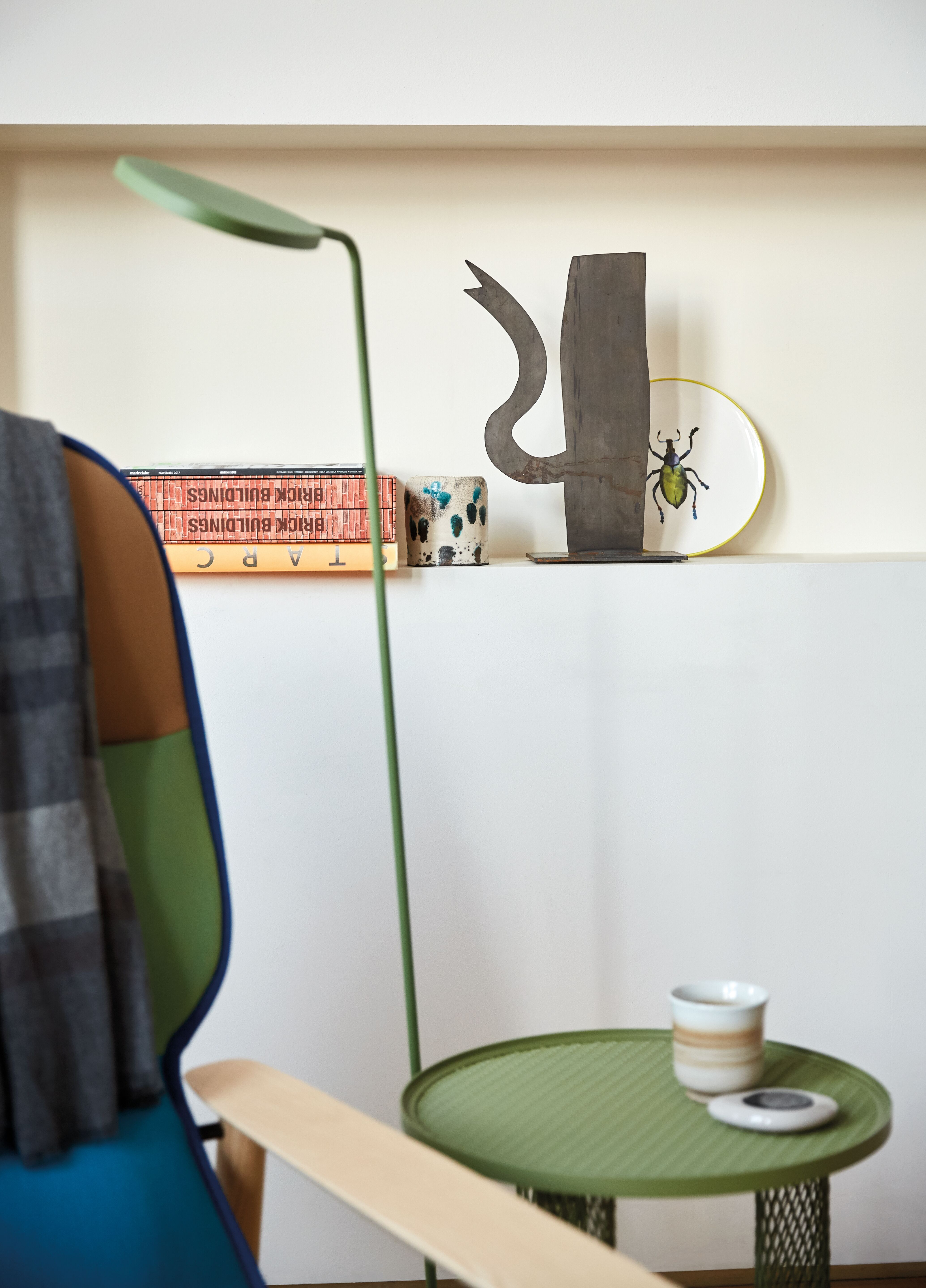 living room with chair and green side table
