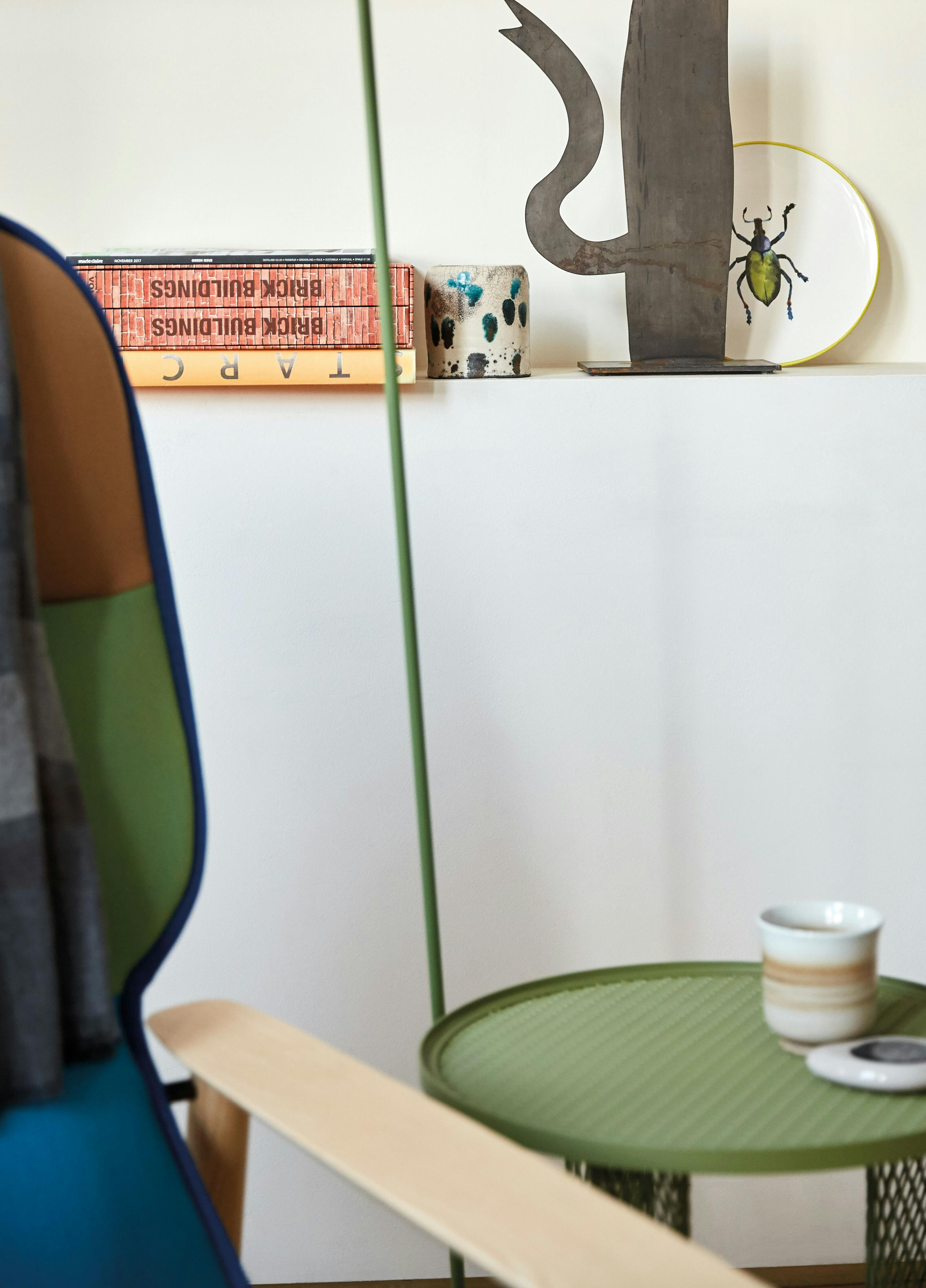 living room with chair and green side table
