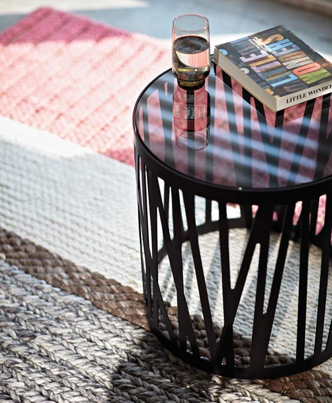living room with glass coffee table 
